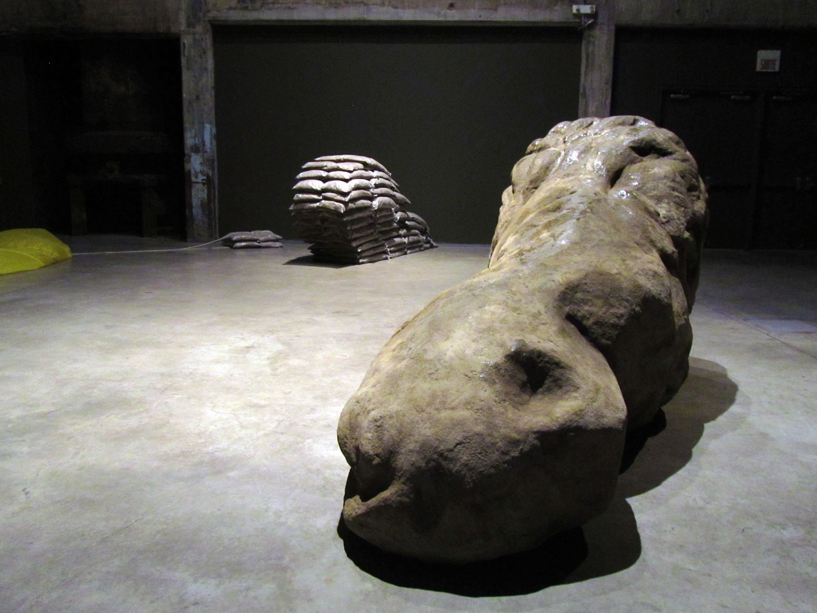 Abbas Akhavan, Mortar, 2012, polyurethane foam, mortar, oil, honey, 118 x 79 x 59 in. (300 x 200 x 150 cm). Installation view, Beacon, Darling Foundry, Montreal, Canada, 2012