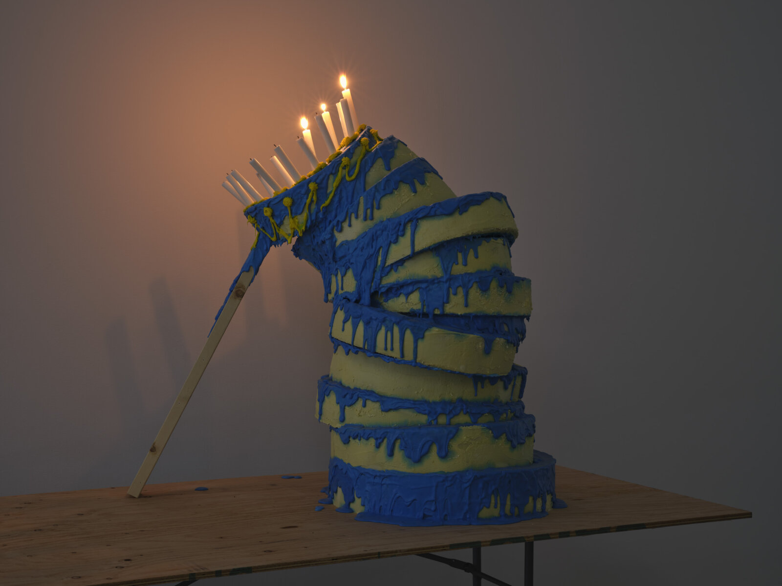 Abbas Akhavan, One Hundred Years, 2025, royal icing (confectioners’ sugar, egg whites, food colouring), stainless steel, hardware, oil lamp, paraffin oil, candles, lumber, dimensions variable. Installation view, One Hundred Years, Morris and Helen Belkin Art Gallery, Vancouver, Canada, 2025