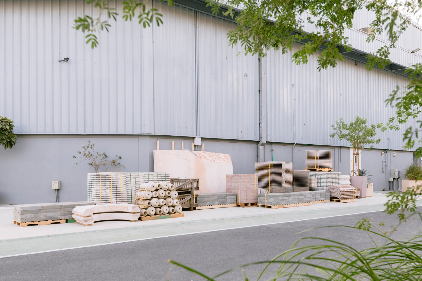Abbas Akhavan, Stock: Variation on a Fountain, 2024, construction materials sourced from Alserkal’s storage, wood, piping, hose, pond pumps, pond liner, water, dimensions variable. Installation view, Walk With Me, Alskeral Arts Foundation, Dubai, UAE, 2024