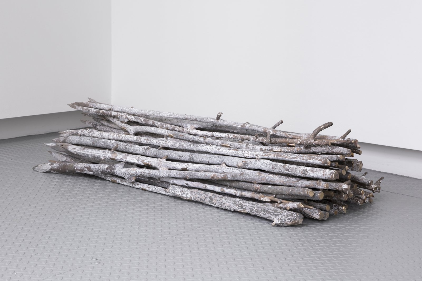 Abbas Akhavan, Study for a Garden, 2017, bronze, 35 unique pieces, each 47 x 2 x 2 in. (120 x 5 x 5 cm). Installation view, A Kiss Under the Tail, Arsenal Contemporary, New York, USA, 2018