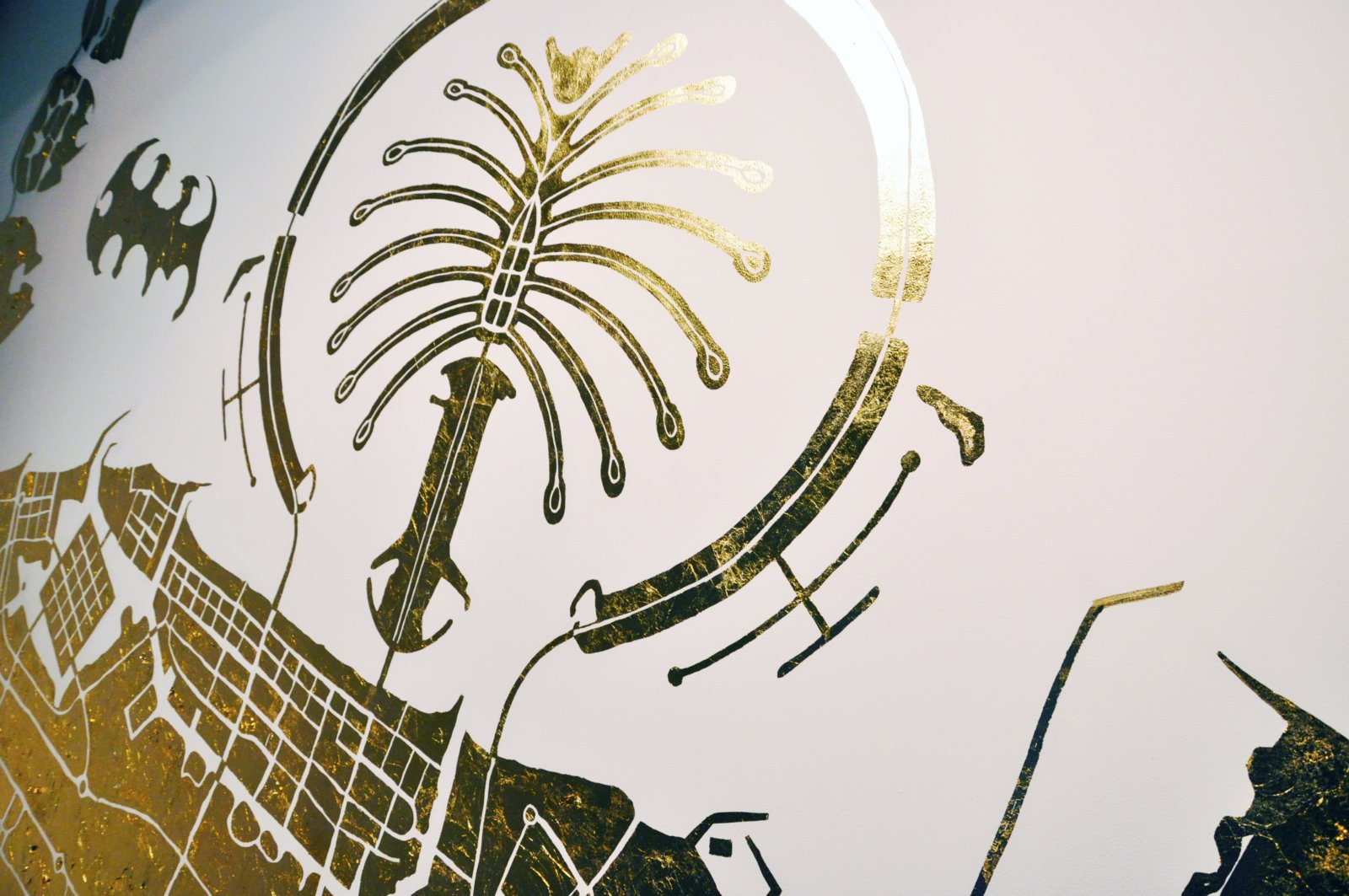 Abbas Akhavan, Study for a Map (detail), 2010, imitation gold leaf on gallery wall, 157 x 551 in. (400 x 1400 cm). Installation view, Islands, The Third Line, Dubai, UAE, 2010