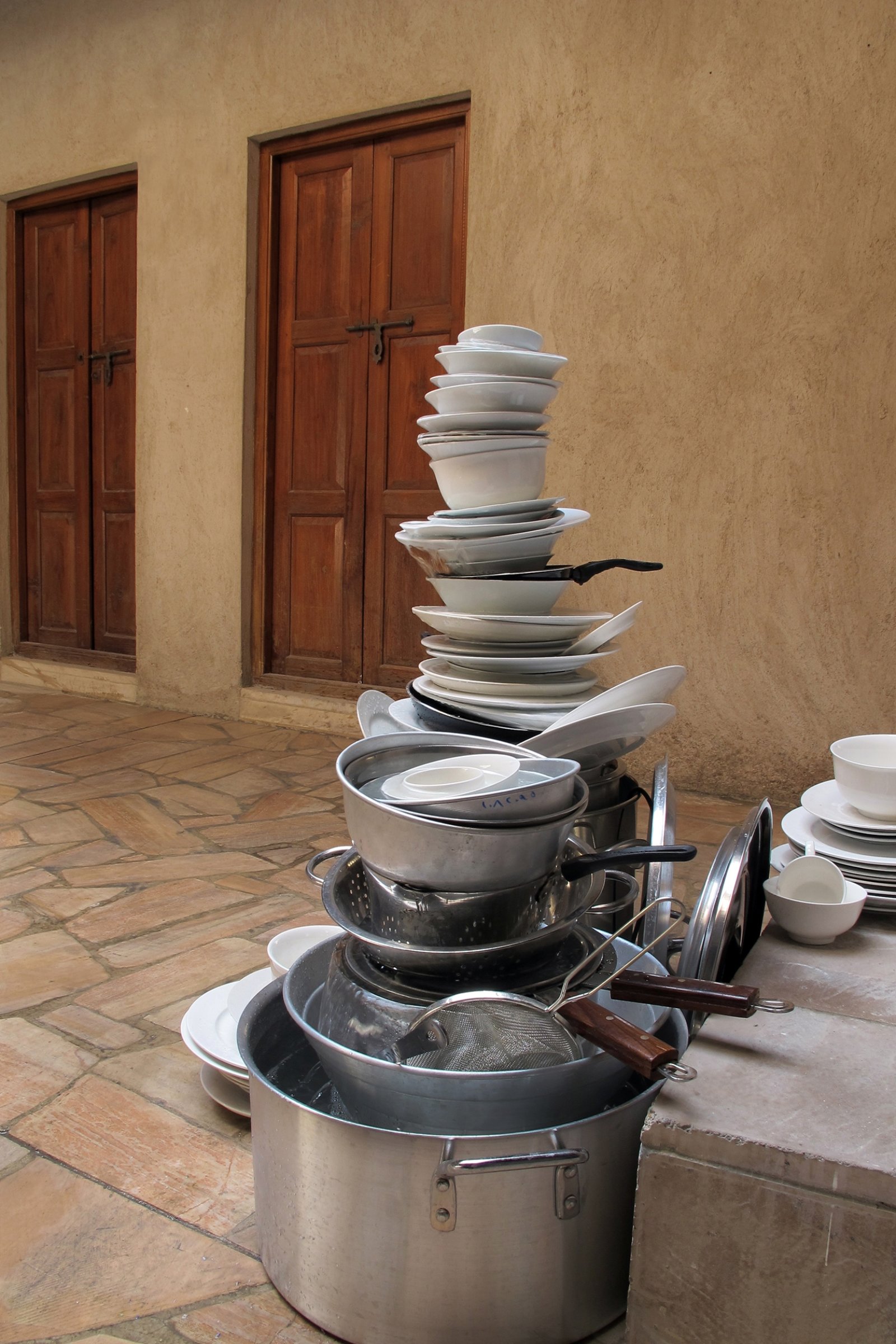 Abbas Akhavan, Variations on Ghosts and Guests: Well, 2011, various dishes, cookware, internal fountain system, water, dimensions variable. Installation view, Variations on Ghosts and Guests, Delfina Foundation, Dubai, UAE, 2011