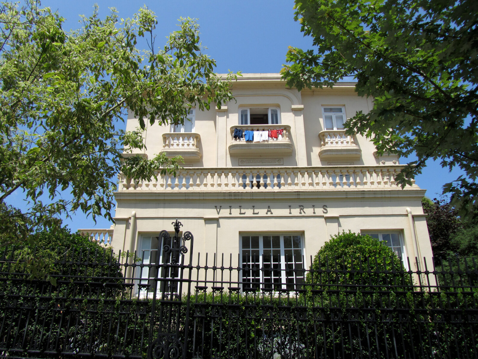 Abbas Akhavan, Variations on Laundry, June 7th and June 11th, 2010, various clothing hung from studio balcony, colours of the garments corresponded with the flags of the teams playing against Spain during FIFA World Cup Finales, dimensions variable. Installation view, Fundación Botín, Santander, Spain, 2010