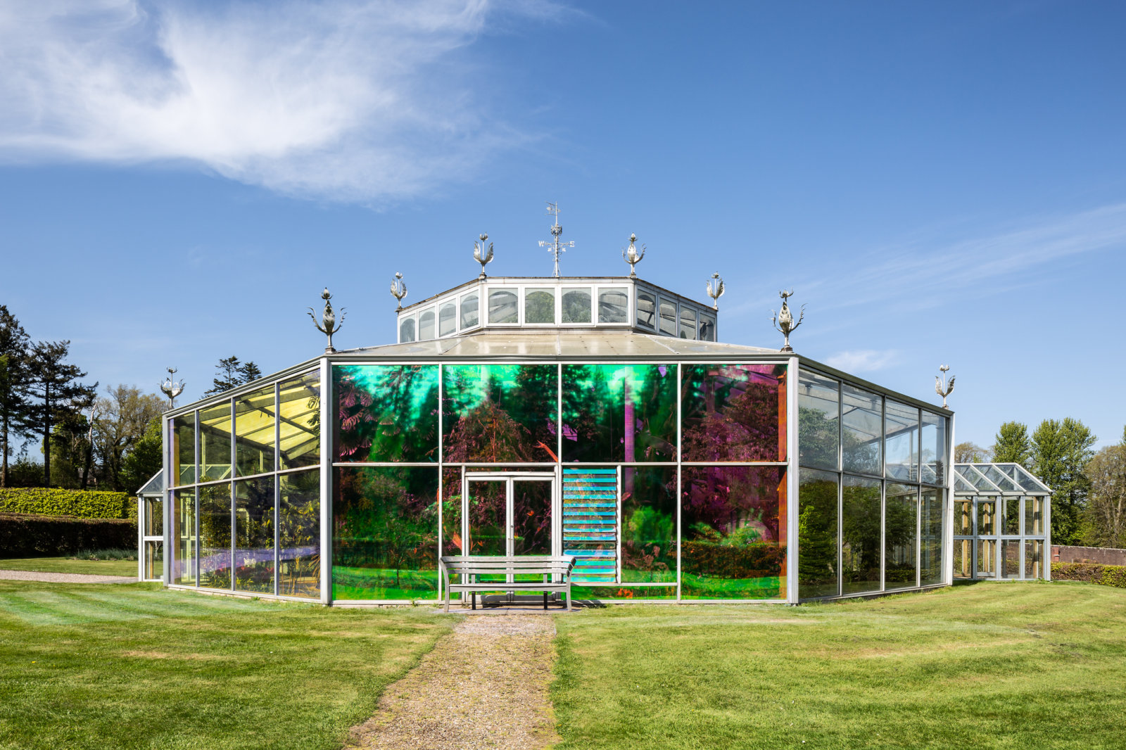 Abbas Akhavan, you used to call it blue sometimes, 2022, transparent dichroic film, audio, dimensions variable, 23 minutes. Installation view,study for a garden, Mount Stuart House, Isle of Bute, Scotland, 2022