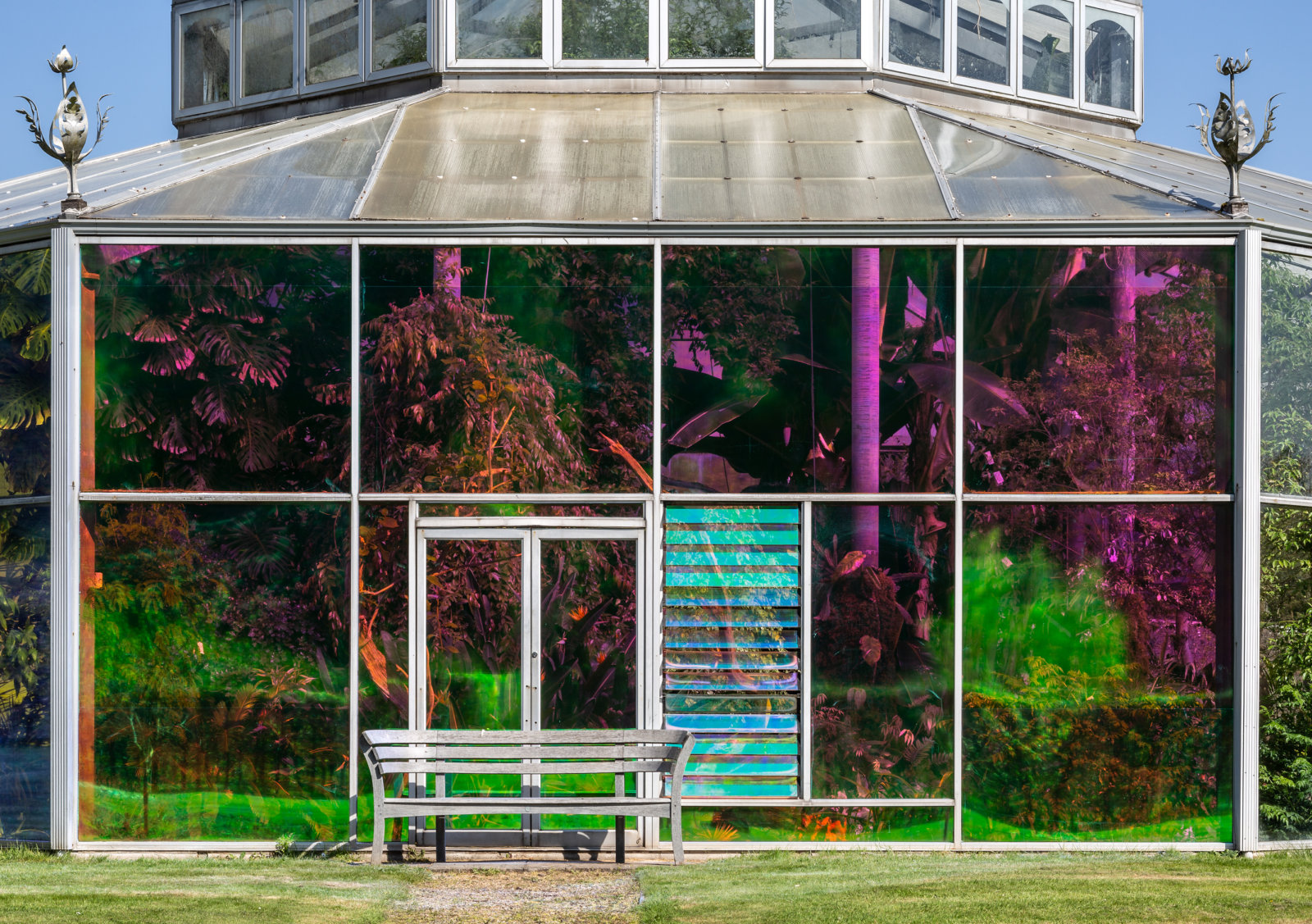 Abbas Akhavan, you used to call it blue sometimes, 2022, transparent dichroic film, audio, dimensions variable, 23 minutes. Installation view,study for a garden, Mount Stuart House, Isle of Bute, Scotland, 2022