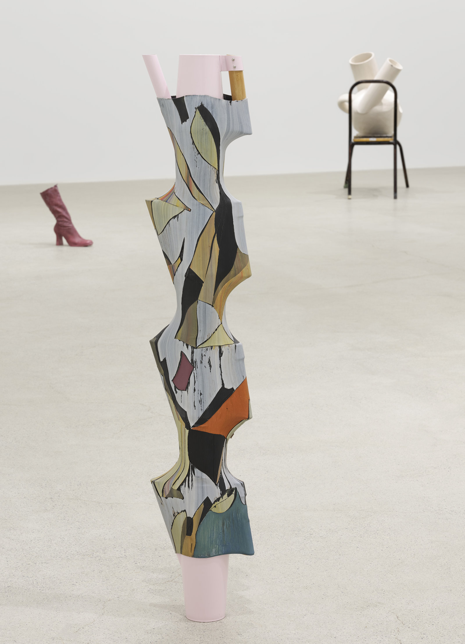 Valérie Blass, Le diable est dans les détails, 2019, pitchers, heat-shrink tubing, acrylic, oil, gouache, 47 x 9 x 4 in. (121 x 22 x 10 cm)