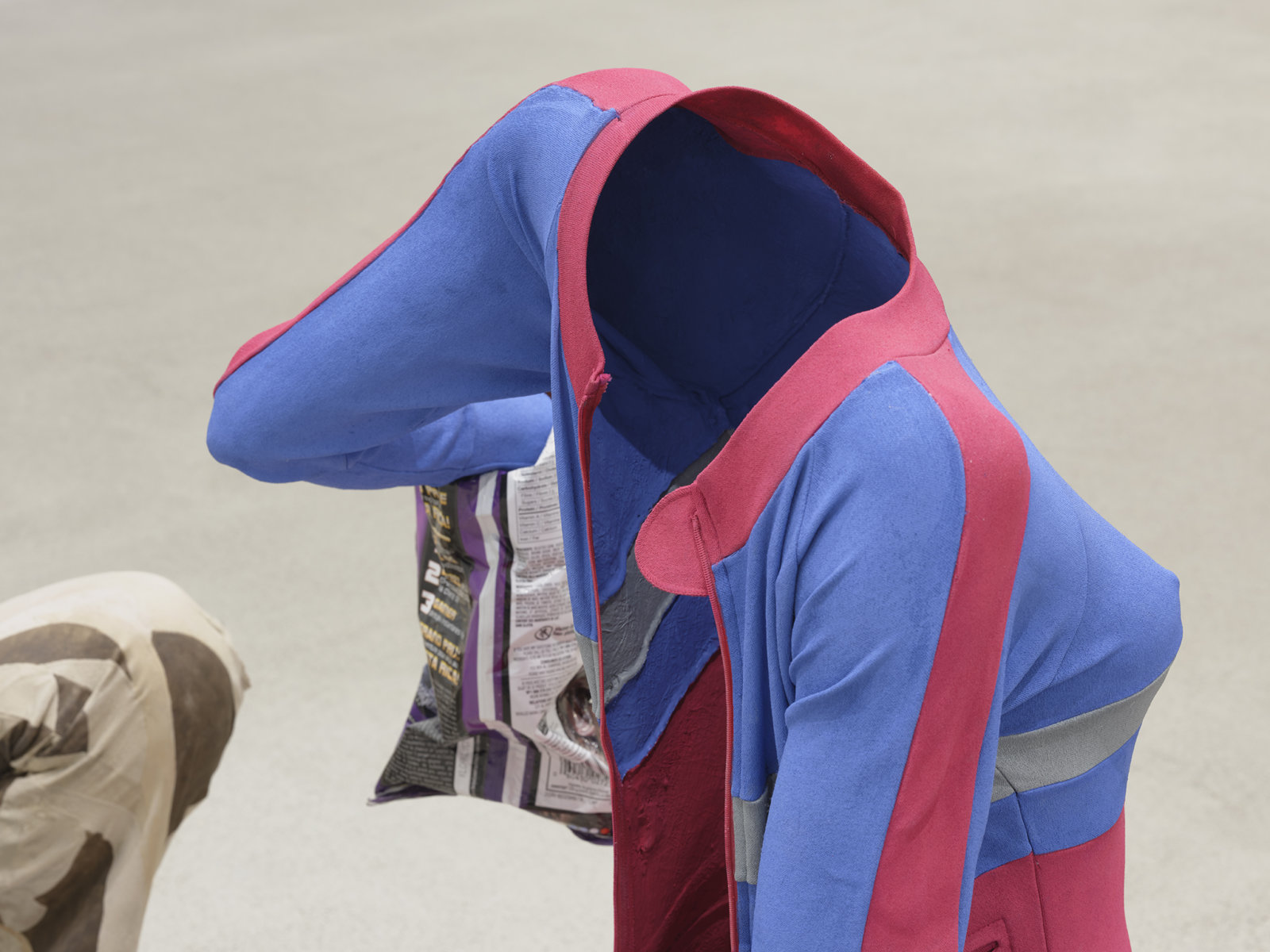 Valérie Blass, Le mime, le modèle et le dupe (The Mime, the Model and the Dupe) (detail), 2019, acrylic, oil, gouache, plaster, copper, chip bag, juice box, jumpsuit, resin, epoxy, fibreglass, 40 x 58 x 21 in. (102 x 147 x 53 cm)