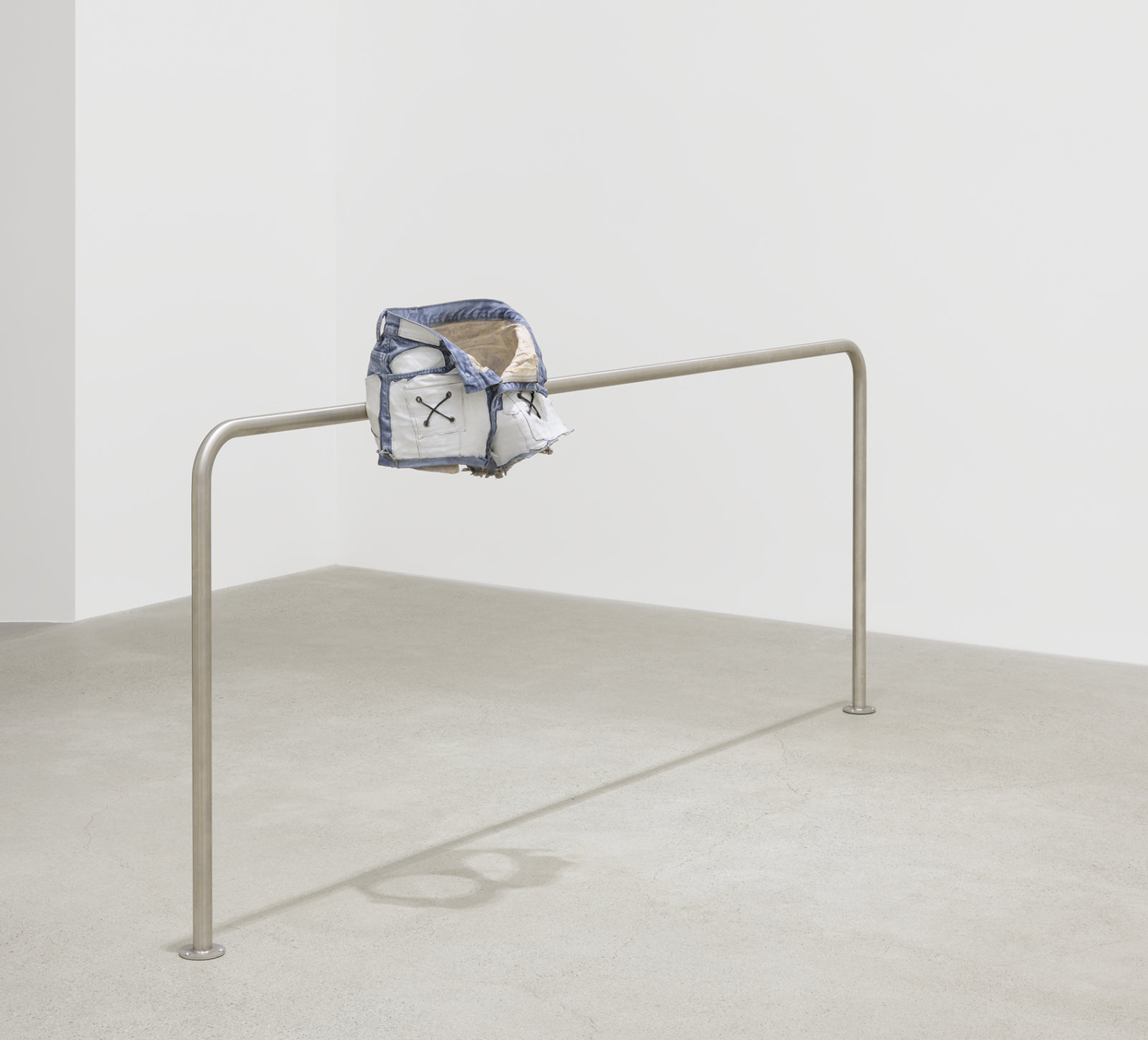 Valérie Blass, L’homme réparé, 2019, stainless steel, denim shorts, epoxy resin, acrylic paint, 41 x 89 x 12 in. (104 x 226 x 31 cm)