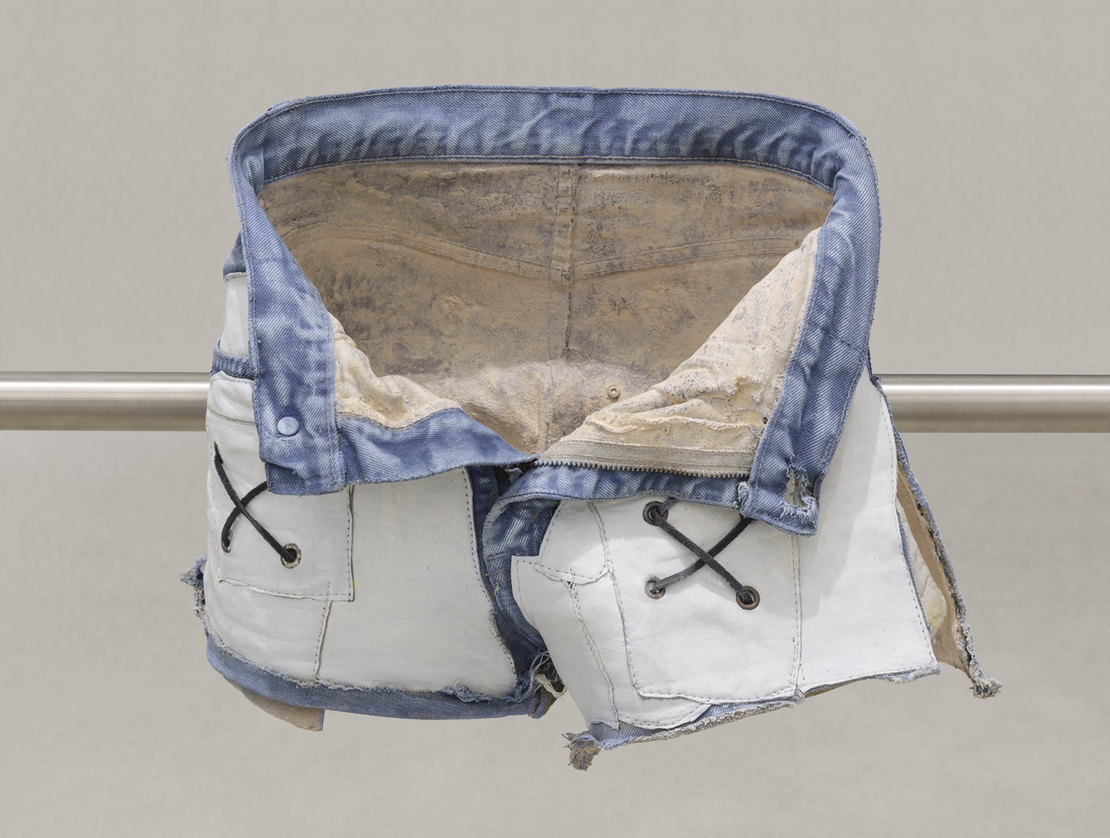Valérie Blass, L’homme réparé (detail), 2019, stainless steel, denim shorts, epoxy resin, acrylic paint, 41 x 89 x 12 in. (104 x 226 x 31 cm)