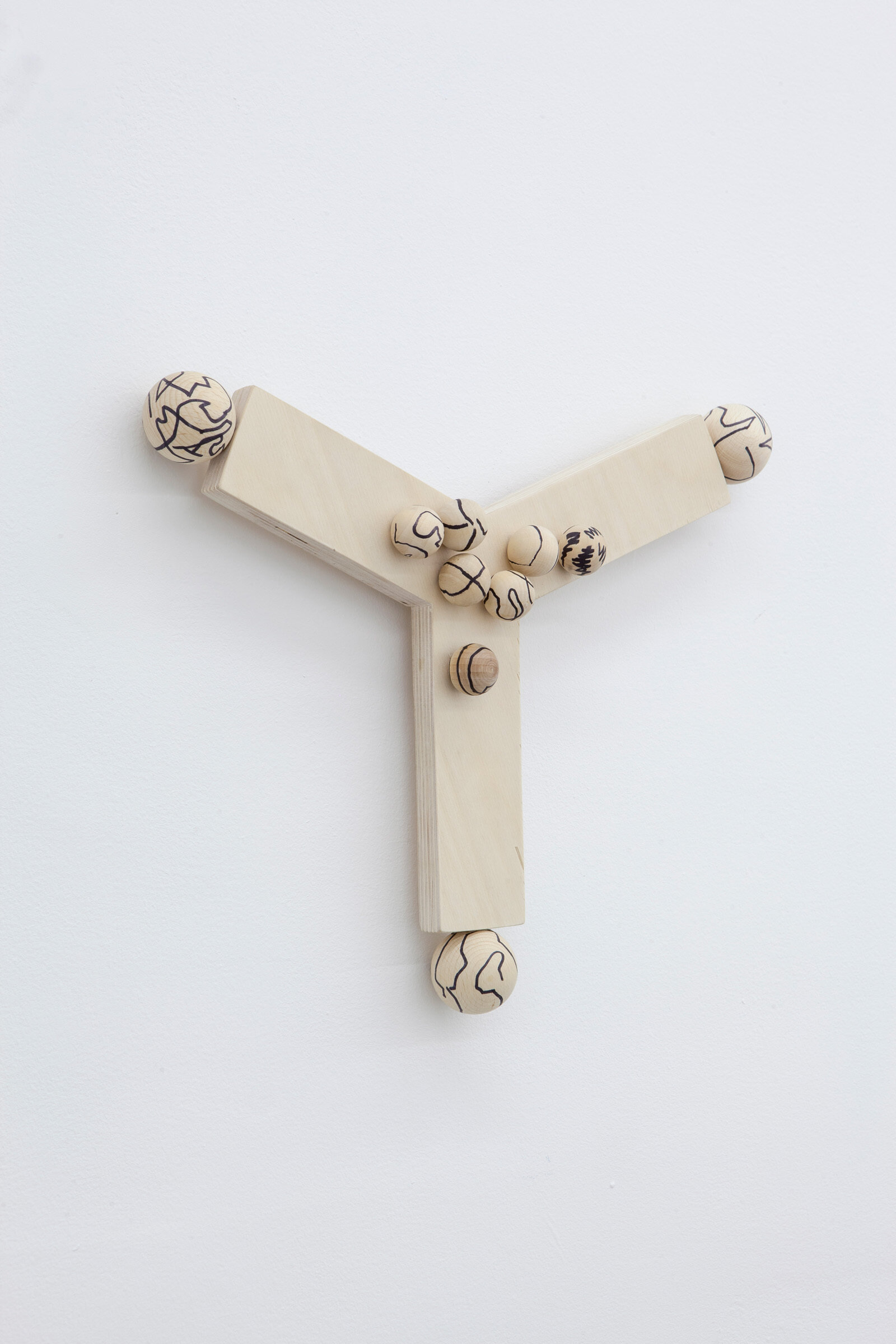 Eli Bornowsky, M, 2013, marker on wood, screws, glue, 16 x 16 x 2 in. (41 x 41 x 4 cm)