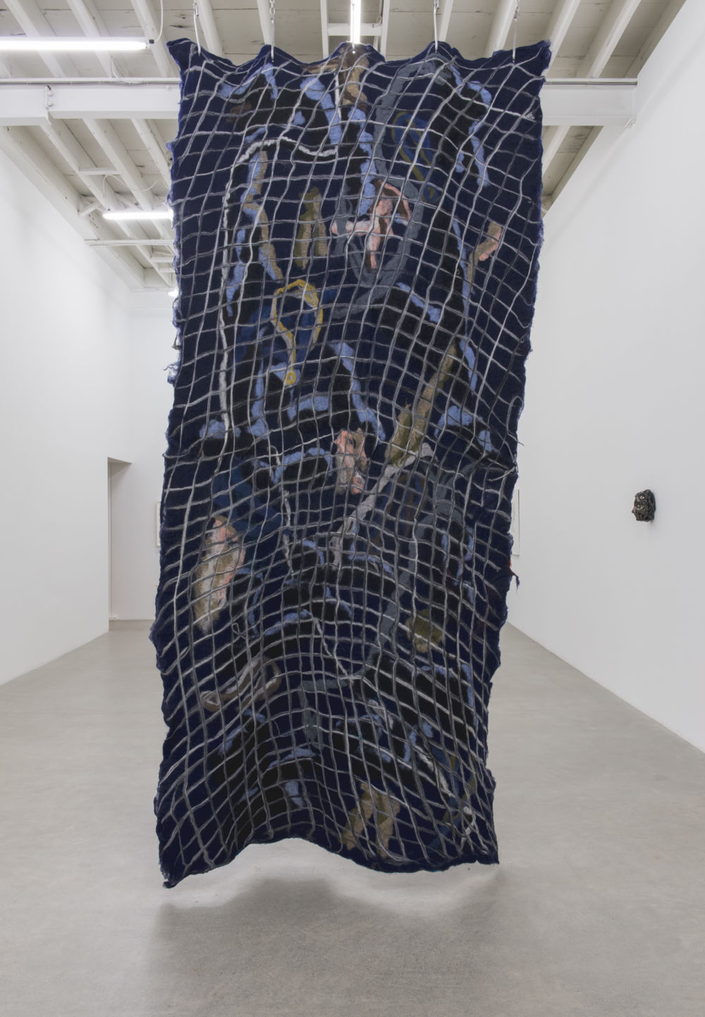 Rebecca Brewer, Silent Running, 2018, wool felt, aluminum hooks, steel chain, 187 x 62 x 12 in. (475 x 158 x 31 cm) by 
