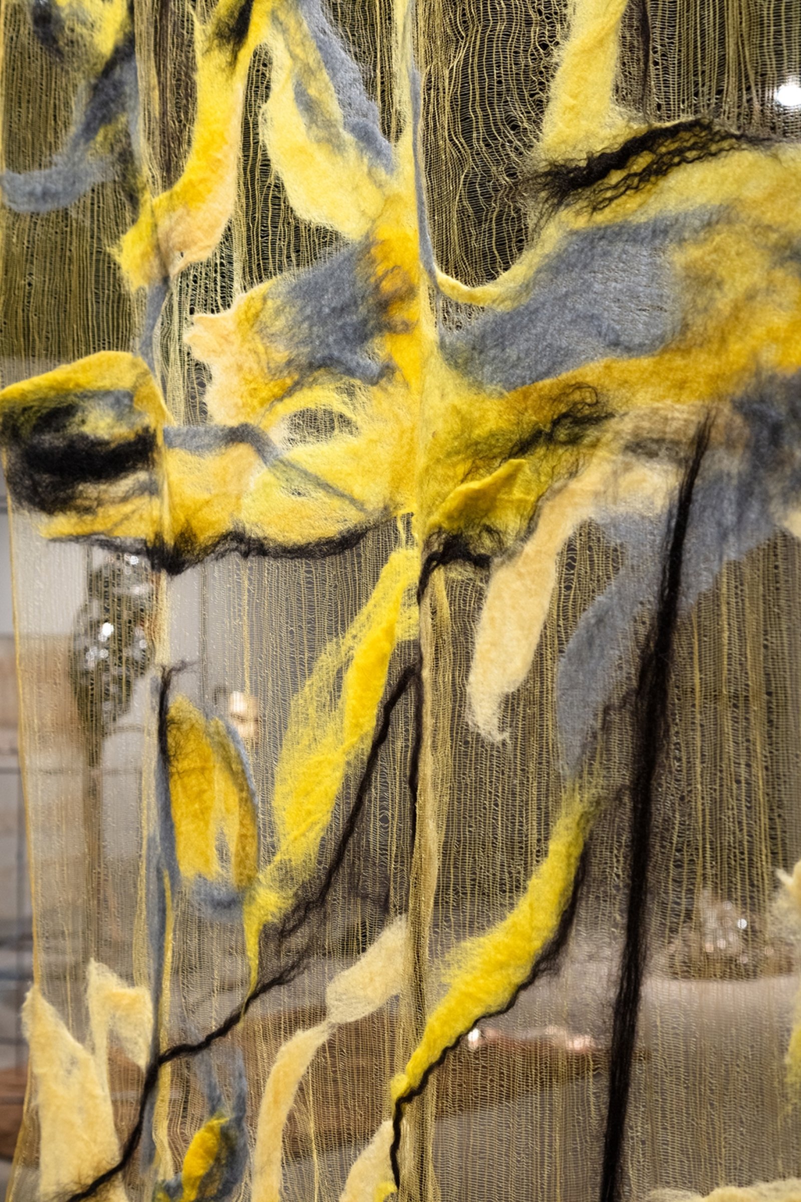 Rebecca Brewer, Scrim: Lush (detail), 2019, silk, wool, ball chain, alligator clips, hooks, 113 x 39 in. (287 x 99 cm). Installation view, Waves and Waves, Oakville Galleries, Oakville, 2019