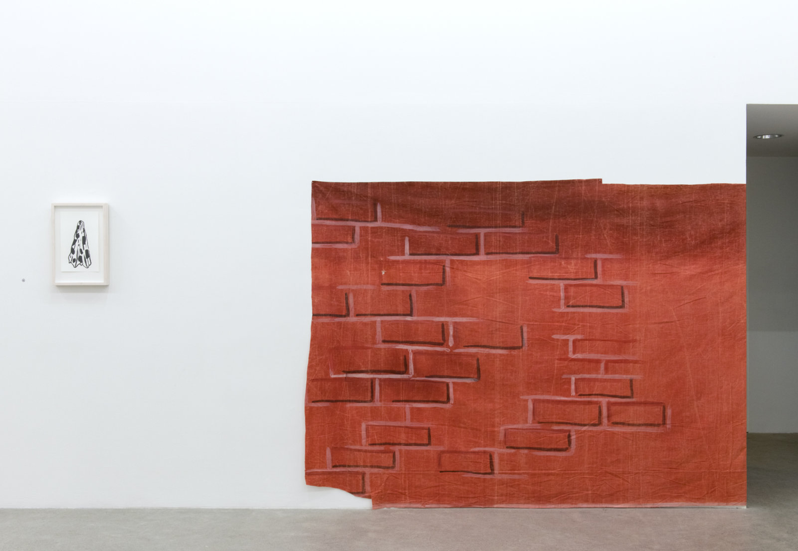 Geoffrey Farmer, LIPSTICK BRICK WITH MID VOWEL AFOUL DISH TOWEL, 2017, ink on paper, theatre backdrop (1939), backdrop: 71 x 200 in (180 x 508 cm), drawing: 18 x 12 in. (45 x 30 cm)