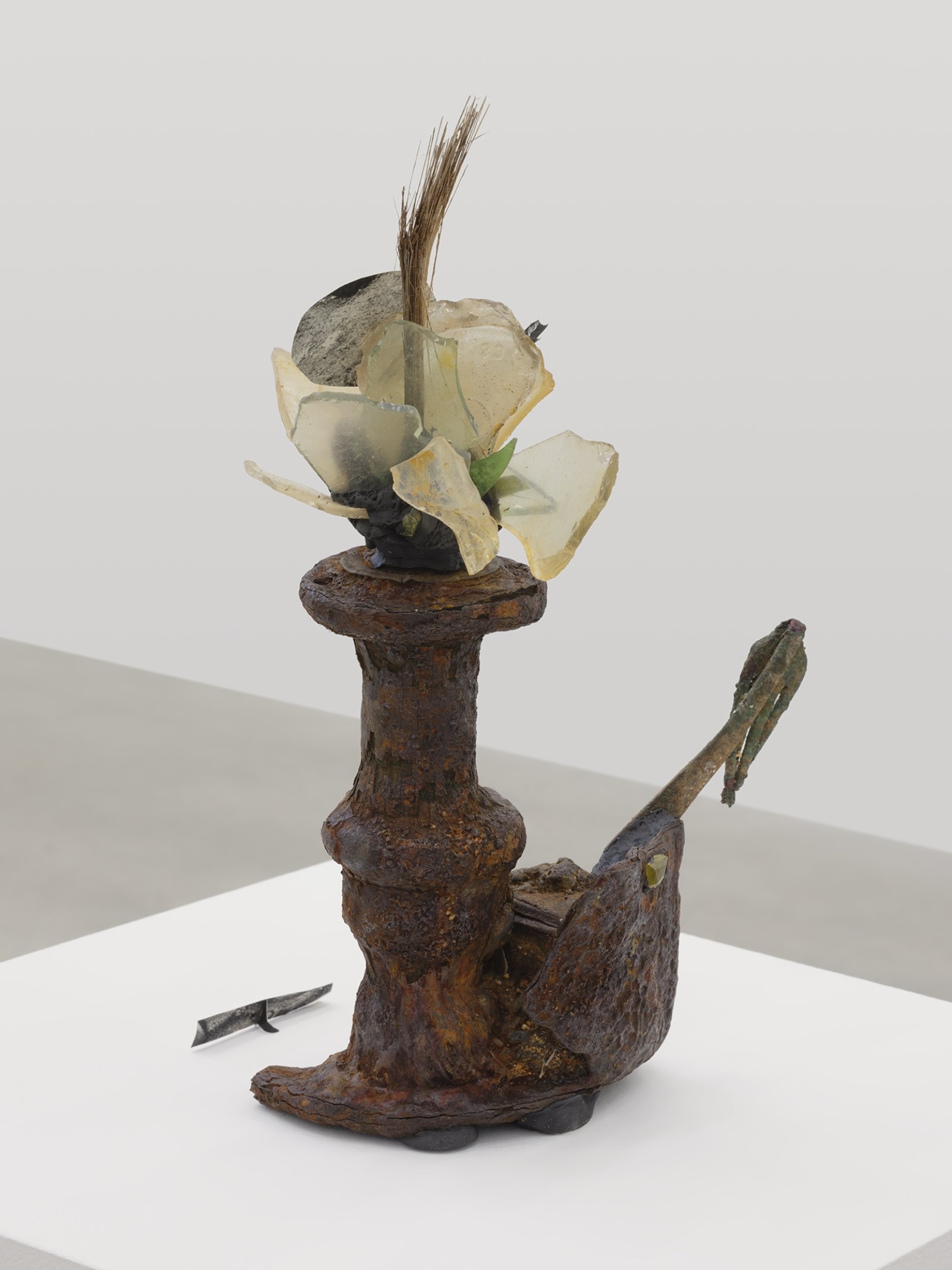 Geoffrey Farmer, Seven Pounds of Red Meat, 2019, metal, glass, coconut, paper, 14 x 9 x 6 in. (36 x 23 x 15 cm)
