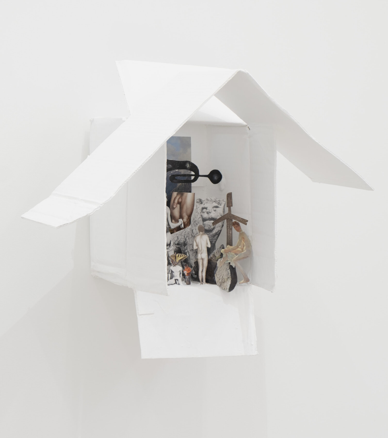 Geoffrey Farmer, The Hellhounds of Thirty-Foot Pool, 2024, cardboard, white paint, wire, putty, book cut-outs, 21 x 24 x 15 in. (53 x 61 x 38 cm)