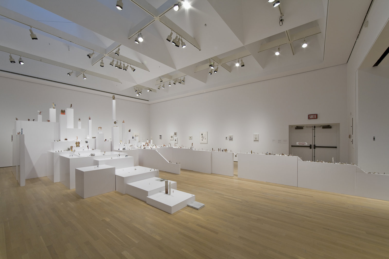 Geoffrey Farmer, The Last Two Million Years, 2007, foamcore plinths, perspex frames and cutouts from selected pages of the history book The Last Two Million Years, dimensions variable. Installation view, Musée d'art contemporain de Montréal, 2008