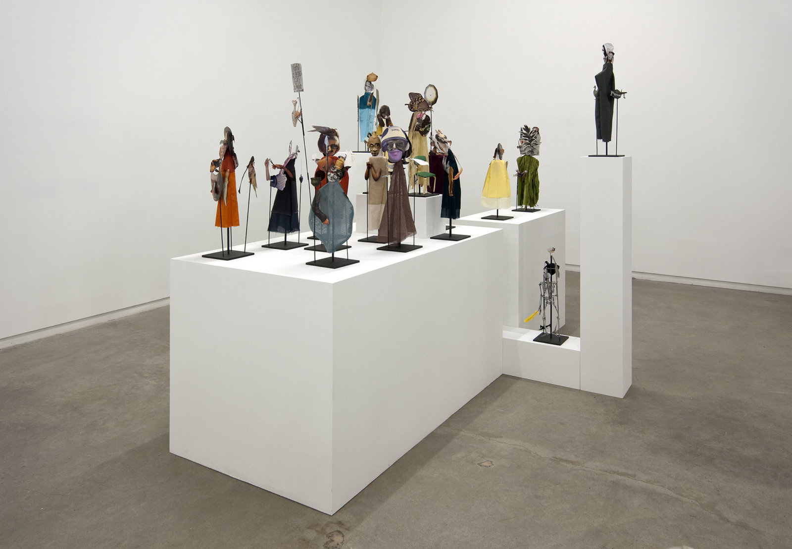 Geoffrey Farmer, The Surgeon and the Photographer, 2009, paper, textile, wood, metal, 365 figures, each figure approximately: 18 x 5 x 5 in. (45 x 13 x 13 cm)