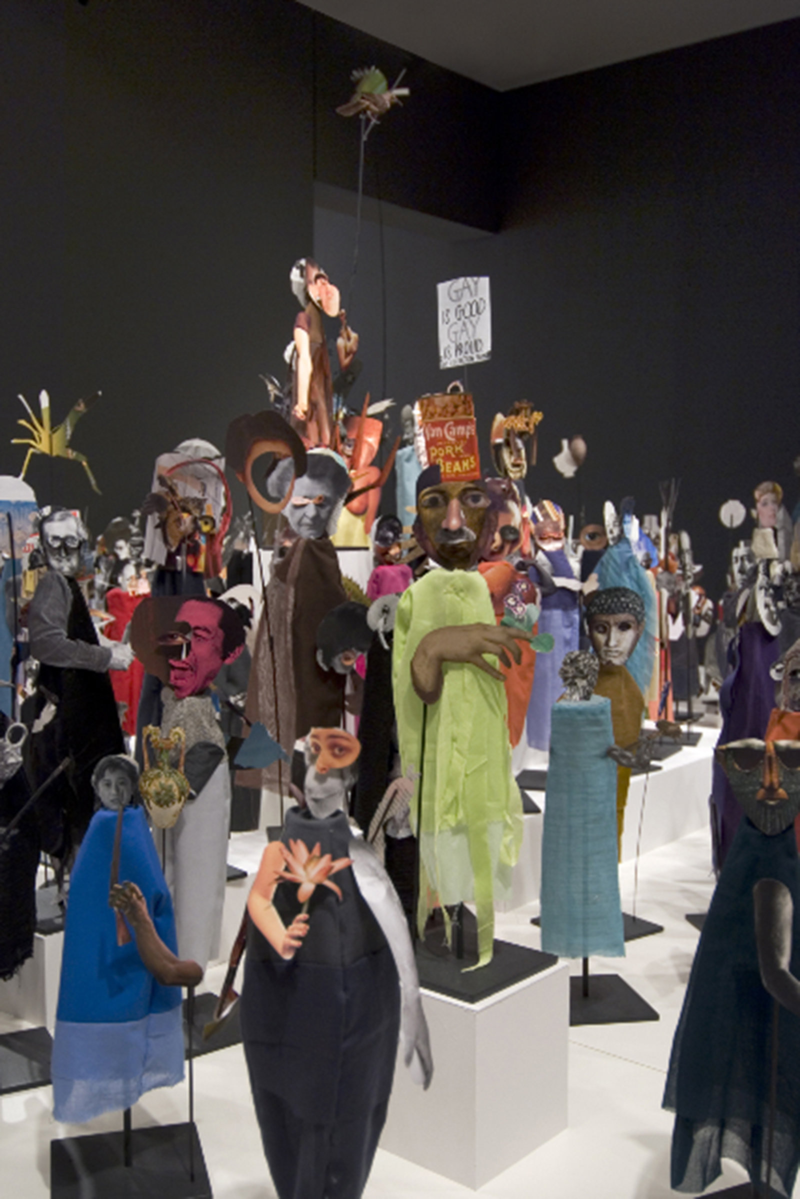 Geoffrey Farmer, The Surgeon and the Photographer, 2009, paper, textile, wood, and metal, 365 figures, dimensions variable. Installation view, Nomads, National Gallery of Canada, Toronto, 2009