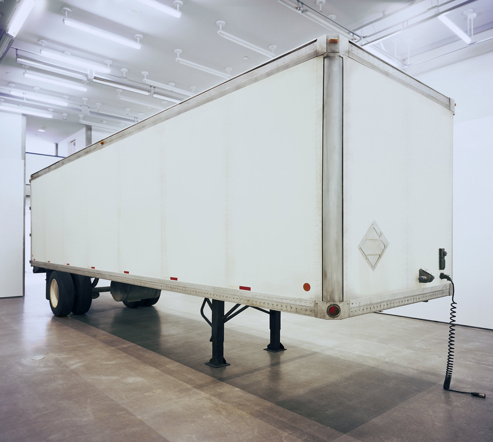 Geoffrey Farmer, Trailer, 2002, steel, fiberboard, mixed media, 134 x 87 x 354 in. (340 x 220 x 900 cm). Installation view, The Blacking Factory, Contemporary Art Gallery, Vancouver, 2002
