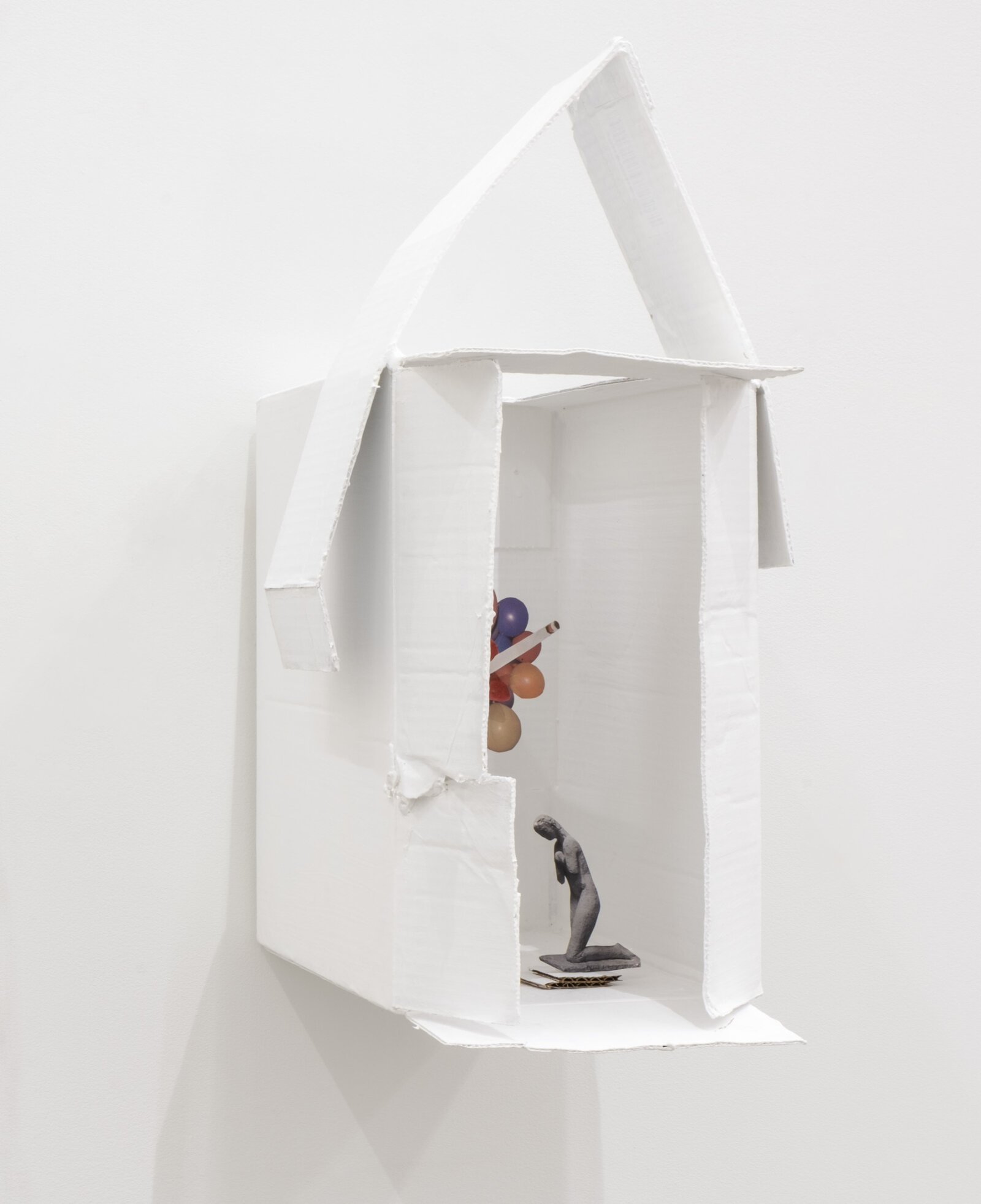 Geoffrey Farmer, For Those Who Want to Release, but Can’t, 2024, cardboard, white paint, wire, putty, book cut-outs, 20 x 10 x 17 in. (51 x 25 x 43 cm)
