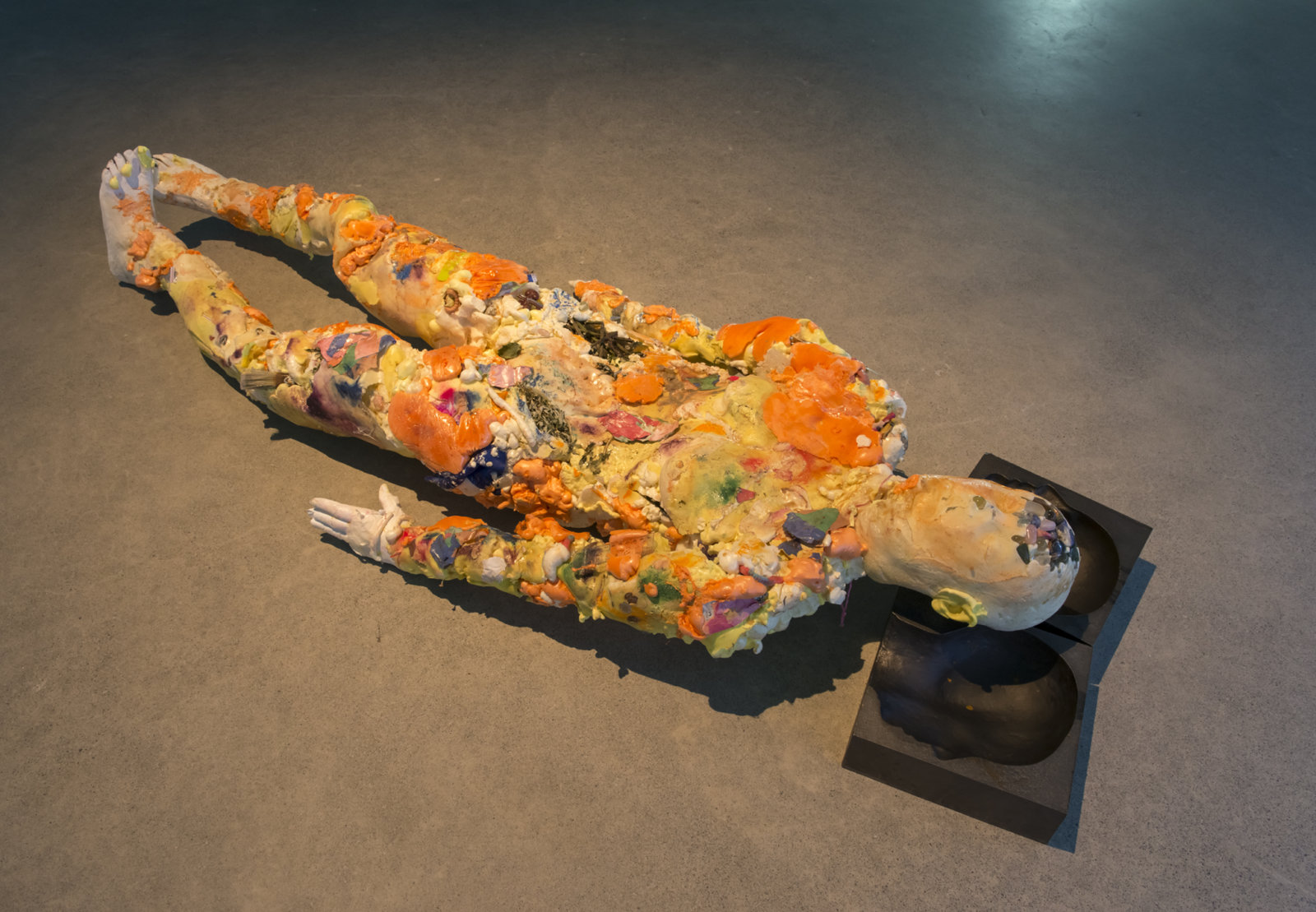 Kasper Feyrer, Corpse, Maiden, 2018, insulation foam, whistle, glass marbles, mineral rocks, broken rulers, coins, lenses, blackberry, mugwort, rope, hinges, gummy worms, plaster cast hands and feet, soil, aluminum armature, latex, pigment, paper, cast iron, miscellaneous materials, 71 x 28 x 13 in. (180 x 71 x 33 cm)