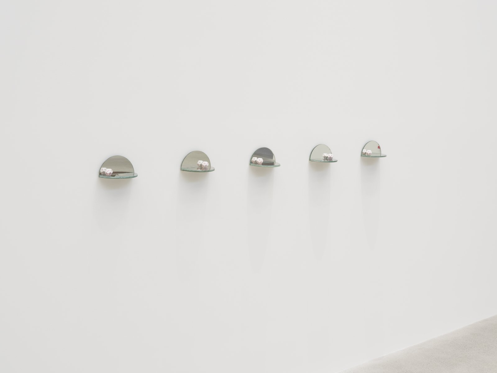Kasper Feyrer, The Ambidextrous Universe, 2018, mirror, liquid mirror, glass, fujiclear transparency, 12-sided die, each 4 x 4 x 7 in. (9 x 9 x 18 cm)