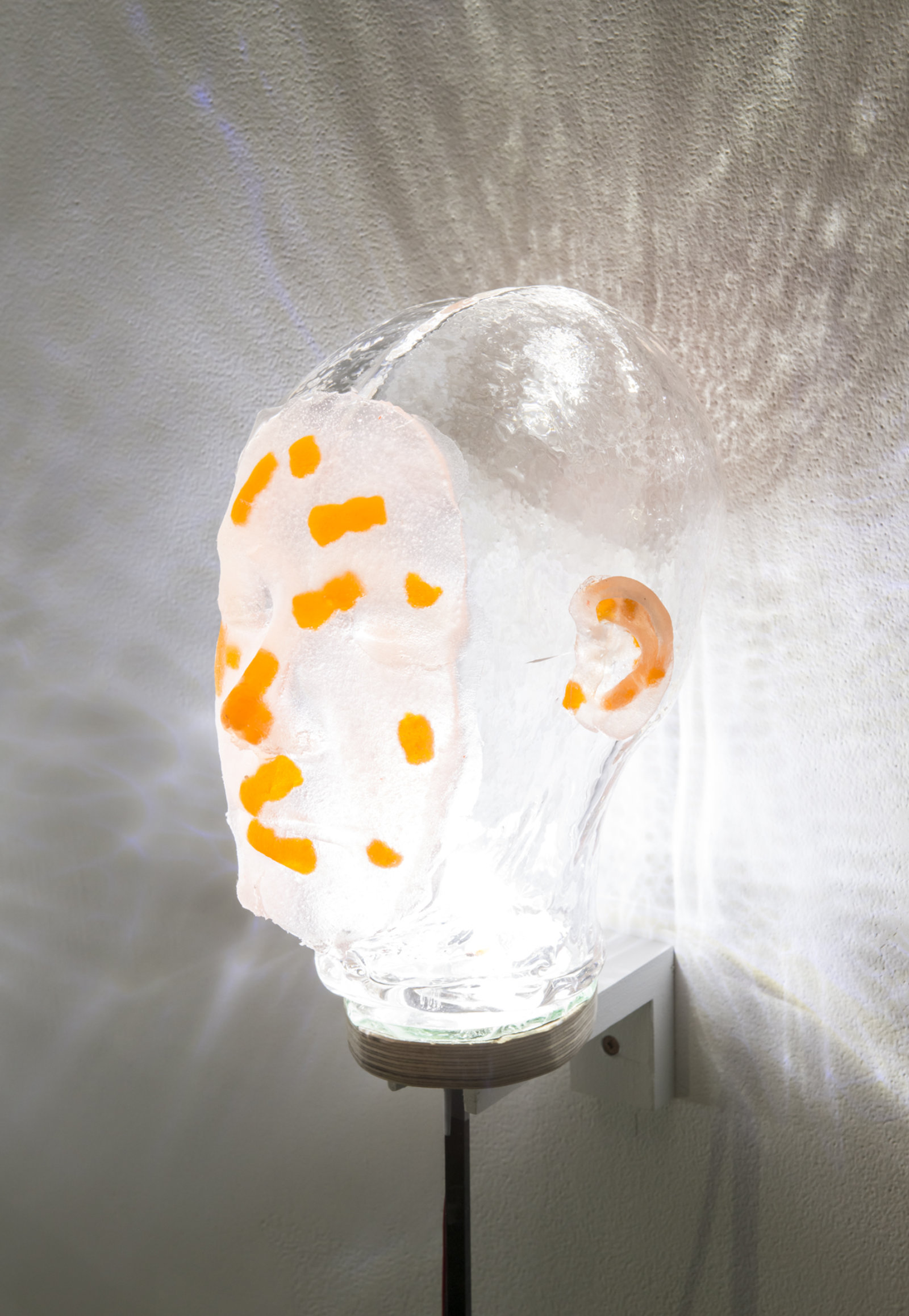 Kasper Feyrer, Witnesses (detail), 2018, sour kids, iron poker, handblown glass, dyed silicone, LED lights, 39 x 7 x 10 in. (99 x 18 x 25 cm)
