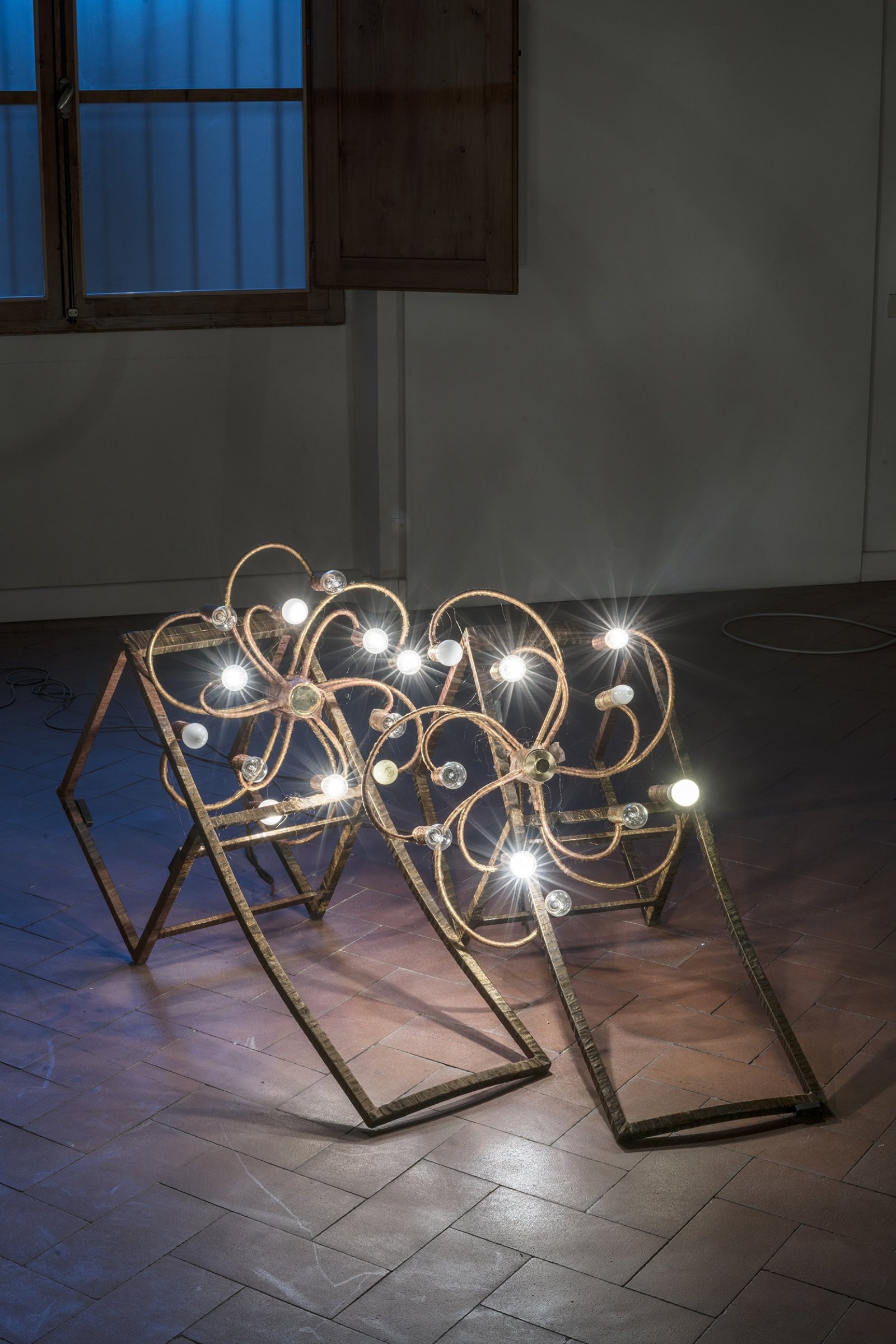 Rochelle Goldberg, Beam of light (I, II), 2018, chairs, brass lamps, polyester organza, 24 x 31 x 47 in. (60 x 78 x 120 cm). Installation view, Casa del Sol, Casa Masaccio, San Giovanni Valdarno, Italy, 2018