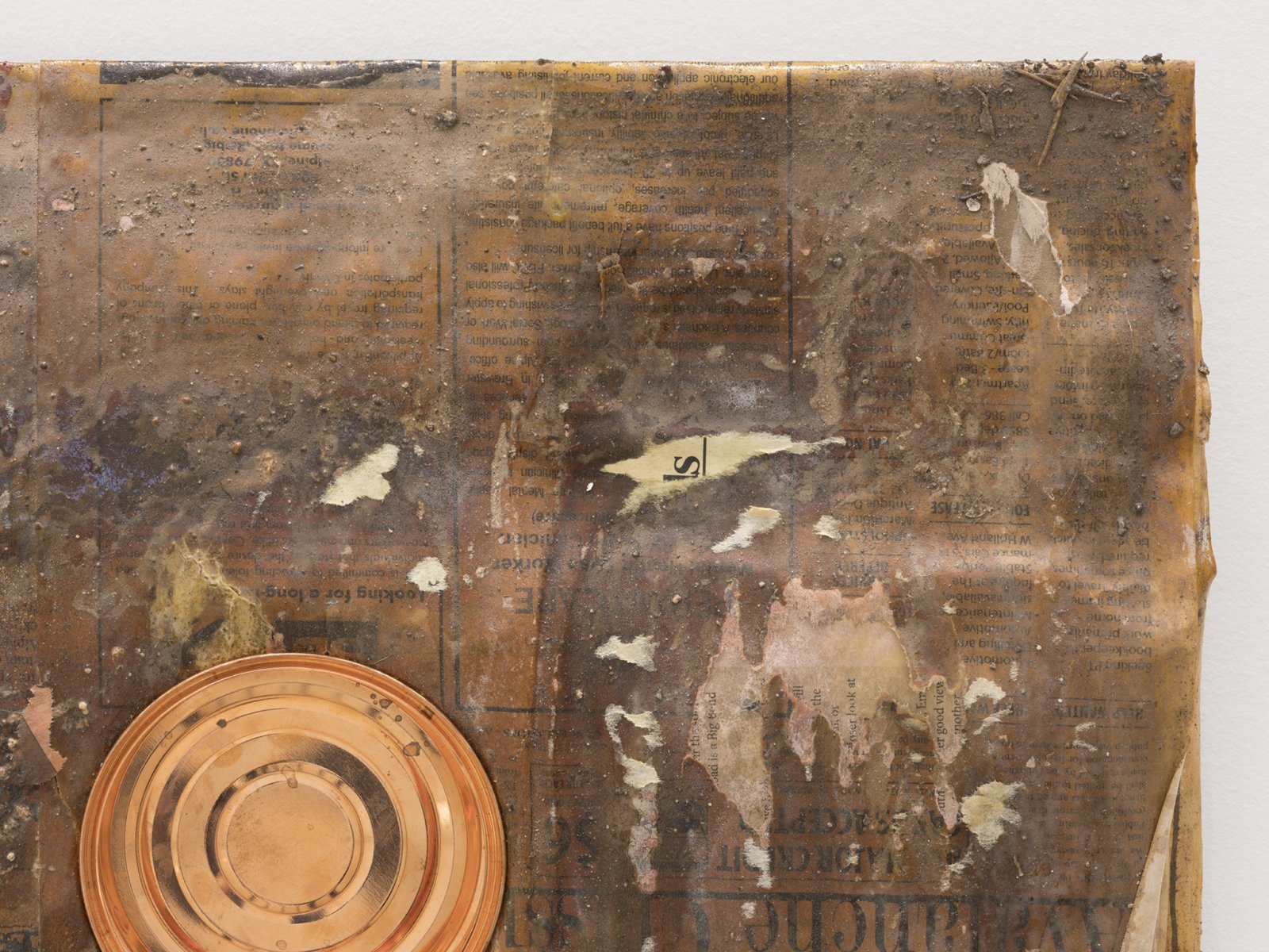 Rochelle Goldberg, Dirty Wall (detail), 2019, newsprint, shellac, copperplated can, dirt from the river, 16 x 18 in. (41 x 45 cm)