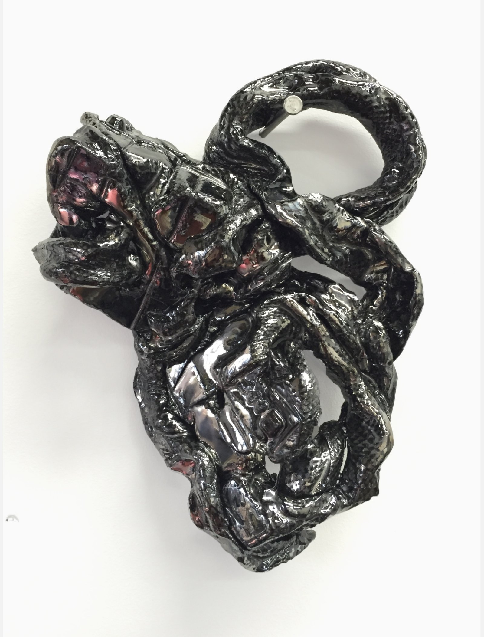 Rochelle Goldberg, In Tangle Out, 2015, fired ceramic and nail, 14 x 9 x 5 in. (36 x 23 x 13 cm)