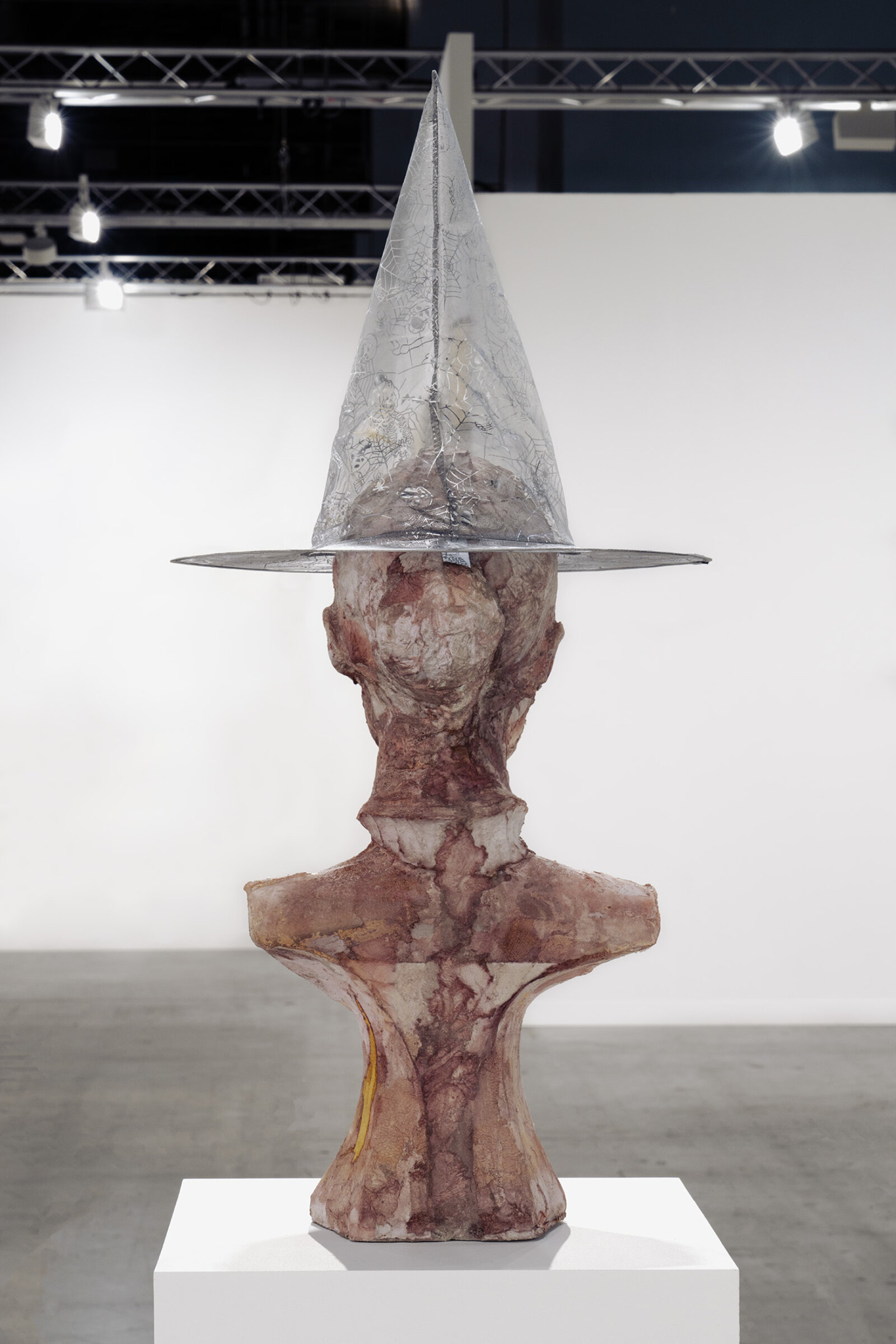 Rochelle Goldberg, Portrait as Witch, 2022, concrete, plaster, shellac, tissue, acrylic dispersion paint, polyester hat, 61 x 16 x 16 in. (155 x 39 x 39 cm)