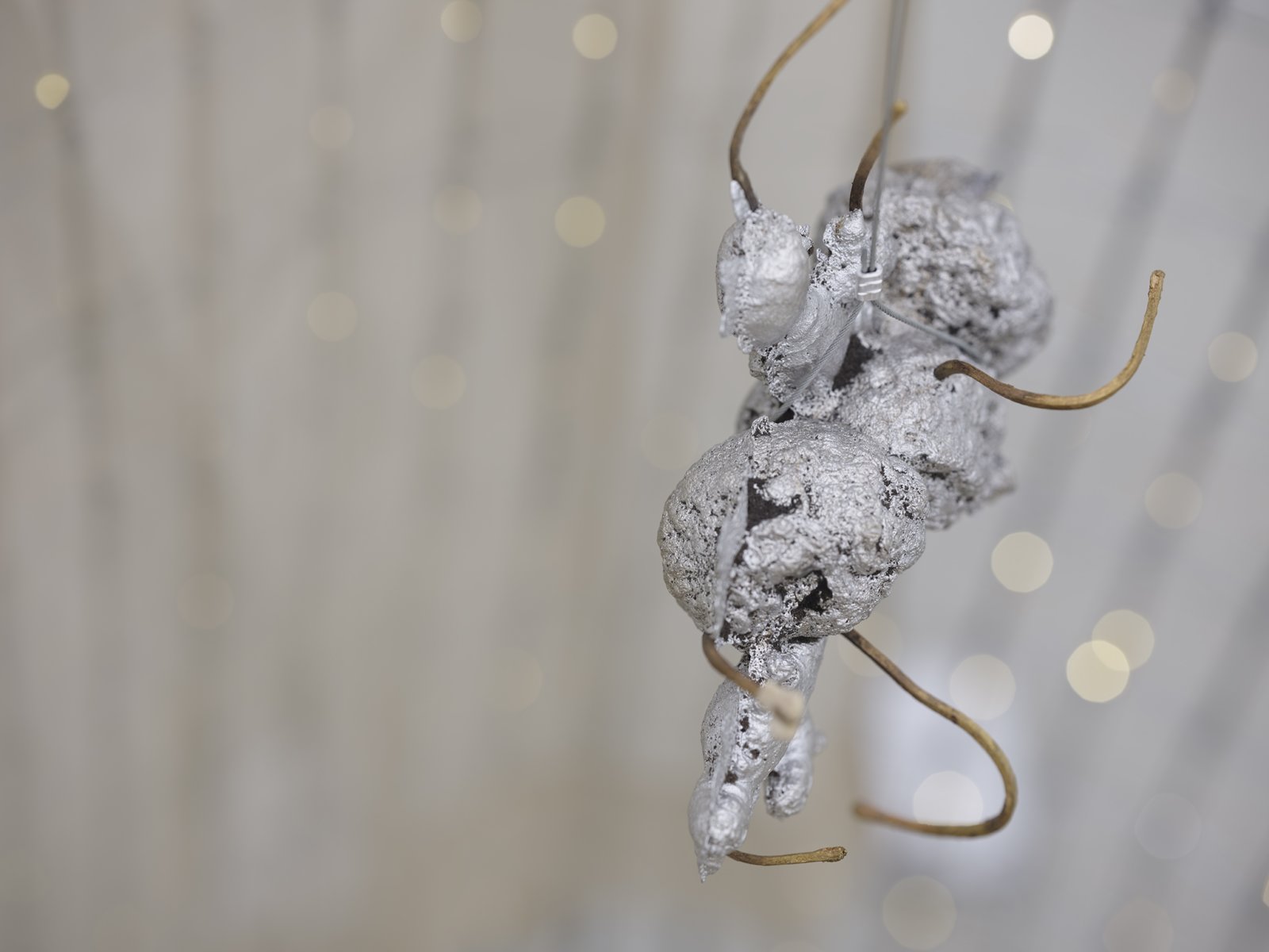 Rochelle Goldberg, Trigger: Towards everything they’ve ever wanted (detail), 2019, ranch fencing, batteries, fairy lights, polyester curtain, aluminum, cast bronze matches, copper wire, 51 x 51 x 44 in. (130 x 130 x 112 cm)