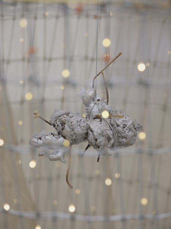 ​​Rochelle Goldberg, Trigger: Towards everything they’ve ever wanted (detail), 2019, ranch fencing, batteries, fairy lights, polyester curtain, aluminum, cast bronze matches, copper wire, 51 x 51 x 44 in. (130 x 130 x 112 cm)​