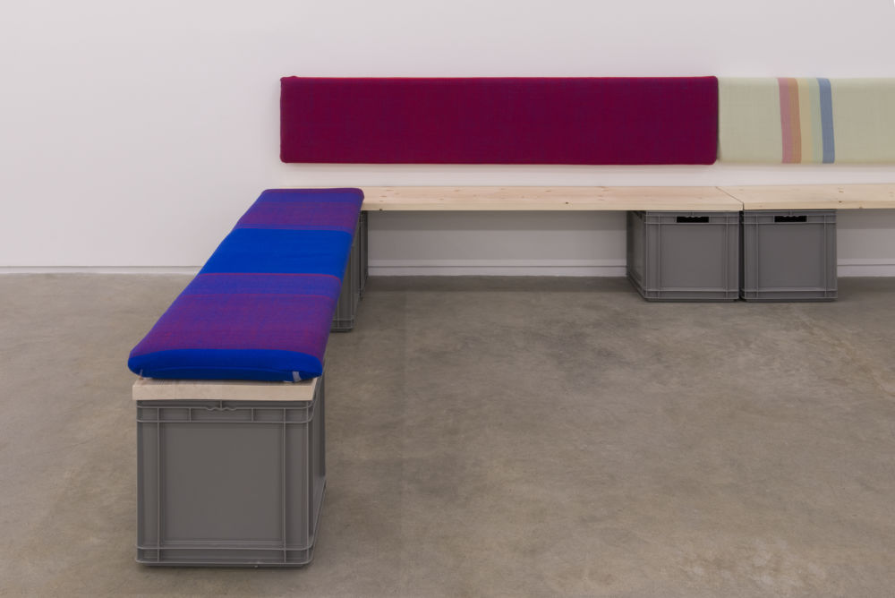 Andrea Büttner, Benches, 2013, handwoven wool backrests, spruce, plastic crates, each 37 x 78 x 16 in. (93 x 2 x 40 cm)​​ by 