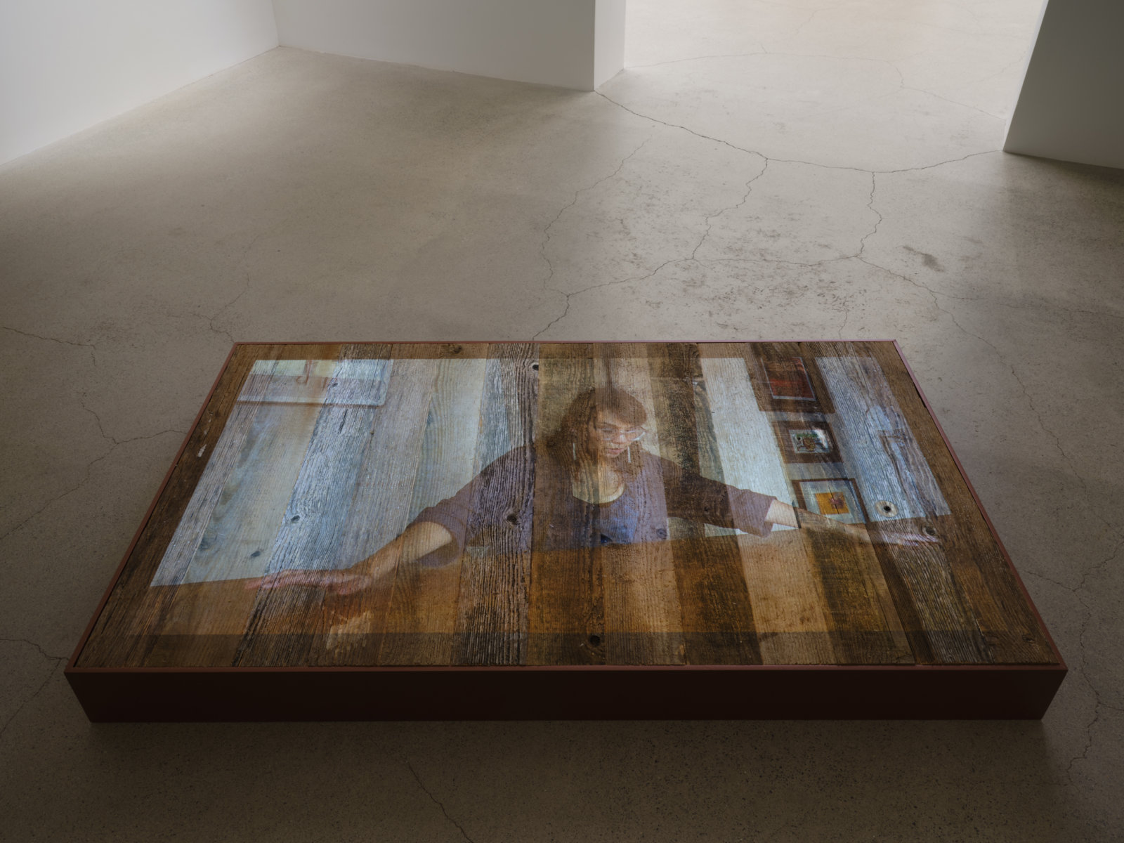 Tanya Lukin Linklater, They fall the ground beneath you (detail), 2018, video projection, performance platforms, marine lumber, paint, performance activation in presence of Sonya Kelliher-Combs’ ‘Curl’ works, dimensions variable