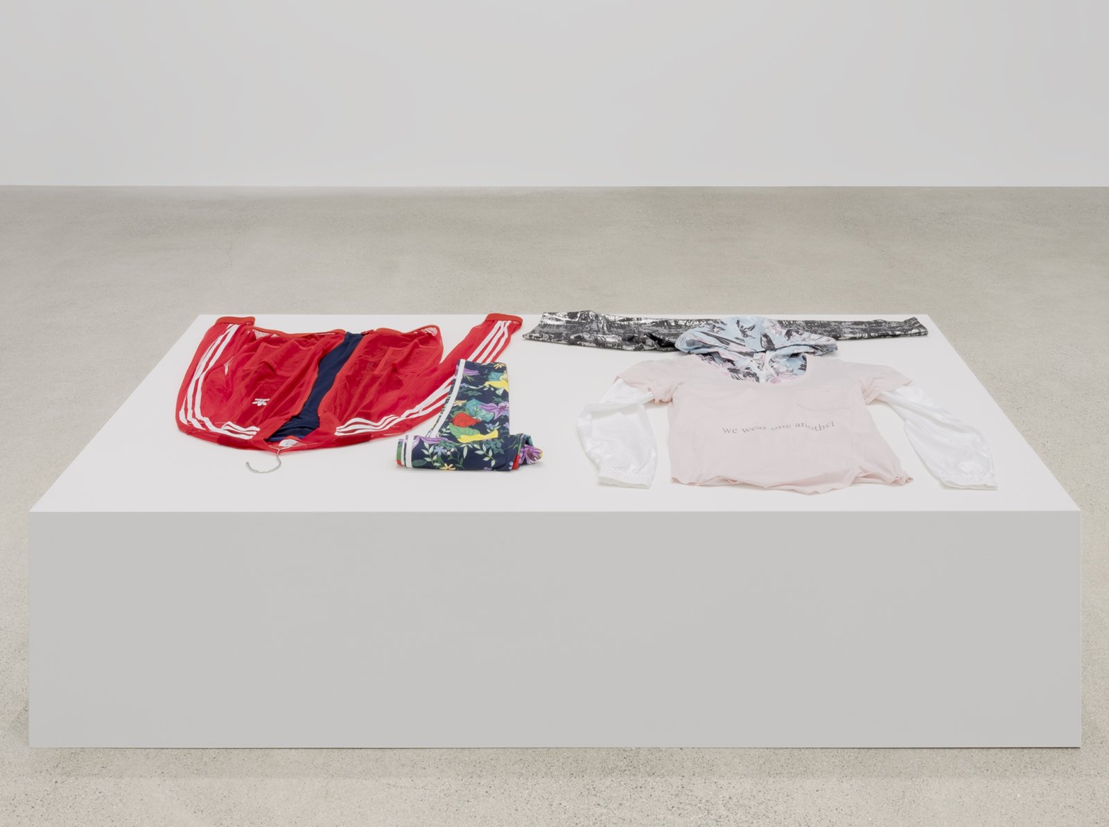 Tanya Lukin Linklater, Attire for performance, We wear one another, 2019, clothing, silkscreen, 18 x 71 x 41 in. (46 x 180 x 104 cm)