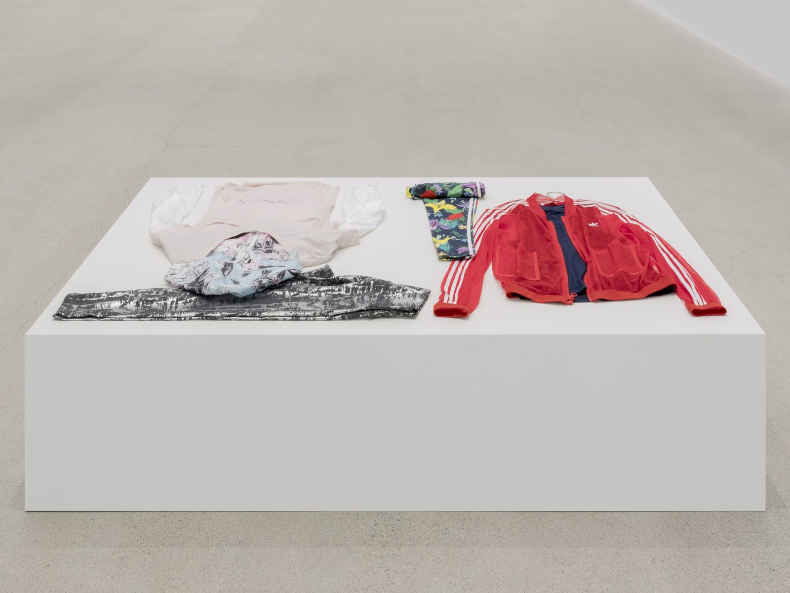 Tanya Lukin Linklater, Attire for performance, We wear one another, 2019, clothing, silkscreen, 18 x 71 x 41 in. (46 x 180 x 104 cm)