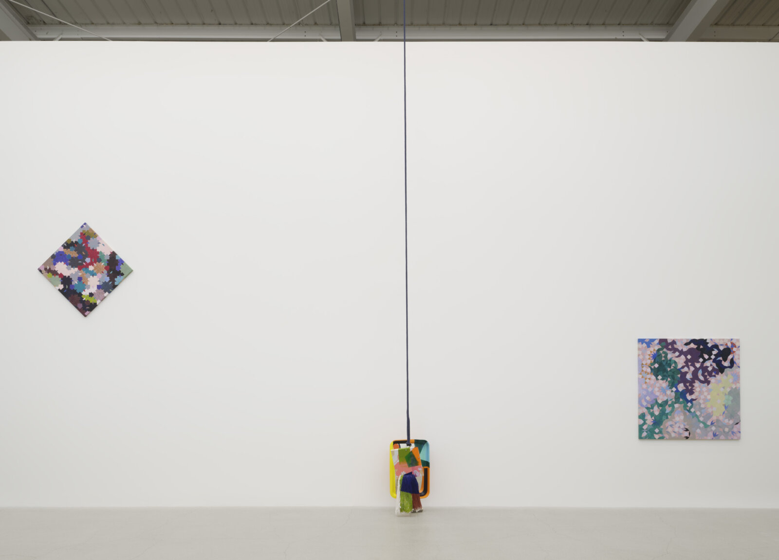 Jessica Stockholder, still over time, 2025, security mirror, framed wooden board, acrylic paint, mop, rope, resin, hardware, dimensions variable. Installation view, is a knot helpful, Catriona Jeffries, Vancouver, 2025