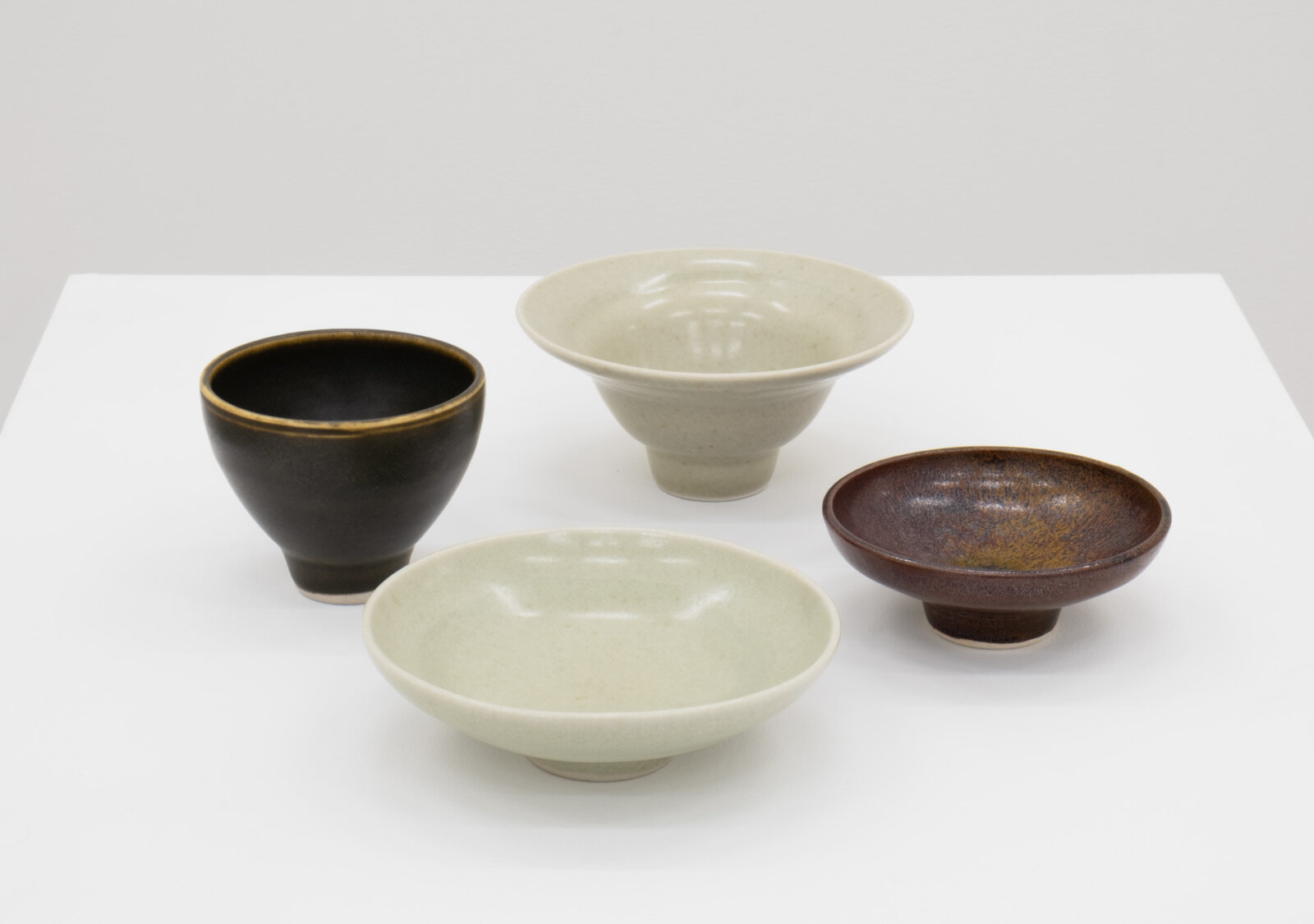 Charmian Johnson, not titled, date unknown, glazed ceramics, 3 x 4 x 4 in. (6 x 9 x 9 cm); 2 x 5 x 5 in. (6 x 13 x 13 cm); 2 x 5 x 5 in. (4 x 13 x 13 cm); 1 x 4 x 4 in. (3 x 10 x 10 cm)