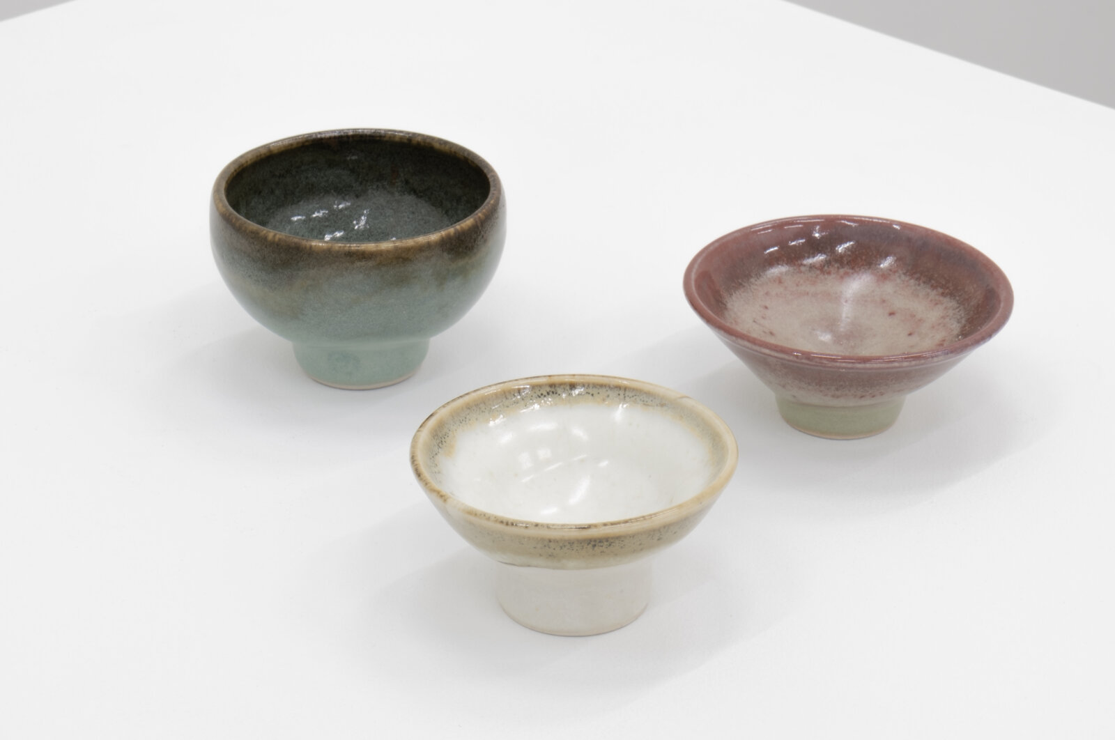 Charmian Johnson, not titled, date unknown, glazed ceramics, 2 x 3 x 3 in. (4 x 8 x 8 cm); 2 x 3 x 3 in. (5 x 8 x 8 cm); 2 x 3 x 3 (4 x 8 x 8 cm)