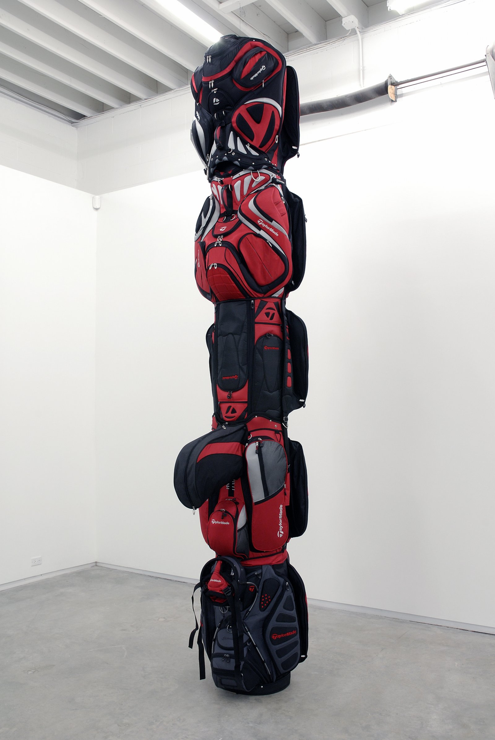 Brian Jungen, 2000, 2007, golf bags, cardboard tube, 146 x 30 x 38 in. (371 x 76 x 97 cm) by Brian Jungen