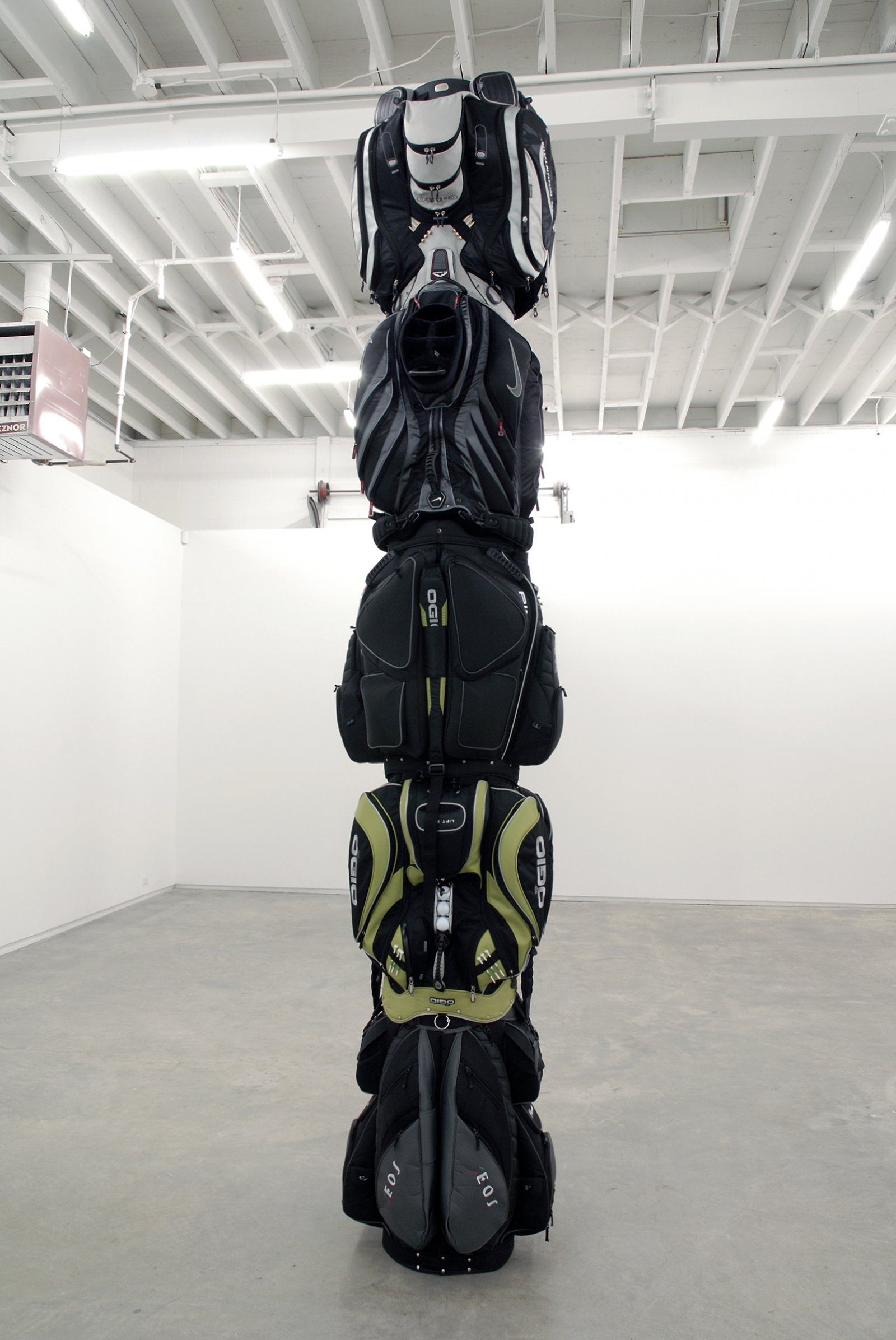Brian Jungen, 2010, 2007, golf bags, cardboard tube, 149 x 29 x 32 in. (378 x 74 x 81 cm) by Brian Jungen