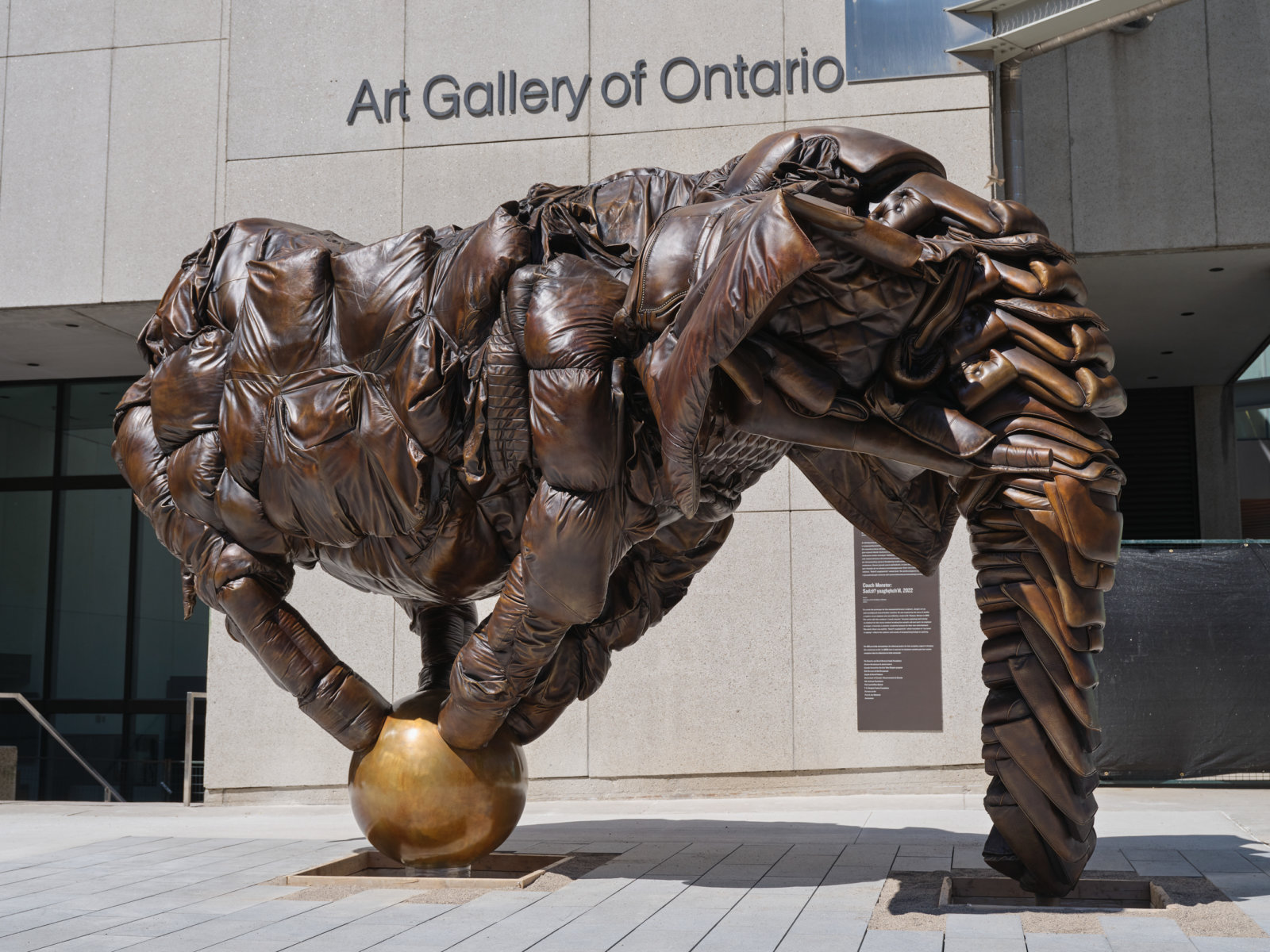 Brian Jungen, Couch Monster: Sadzěʔ yaaghęhch’ill, 2022, bronze, 149 x 131 x 219 1/2 in. (378.5 x 332.7 x 557.5 cm), collection of the Art Gallery of Ontario. Commission, with funds from Government of Canada/Gouvernement du Canada, Canada Council for the Arts’ New Chapter program, The Renette and David Berman Family Foundation, Charles Brindamour &amp; Josée Letarte, Bob Dorrance &amp; Gail Drummond, Angela &amp; David Feldman, Hal Jackman Foundation, Phil Lind &amp; Ellen Roland, T. R. Meighen Family Foundation, Partners in Art, Paul &amp; Jan Sabourin, an anonymous donor, and with funds by exchange from Morey and Jennifer Chaplick, 2022