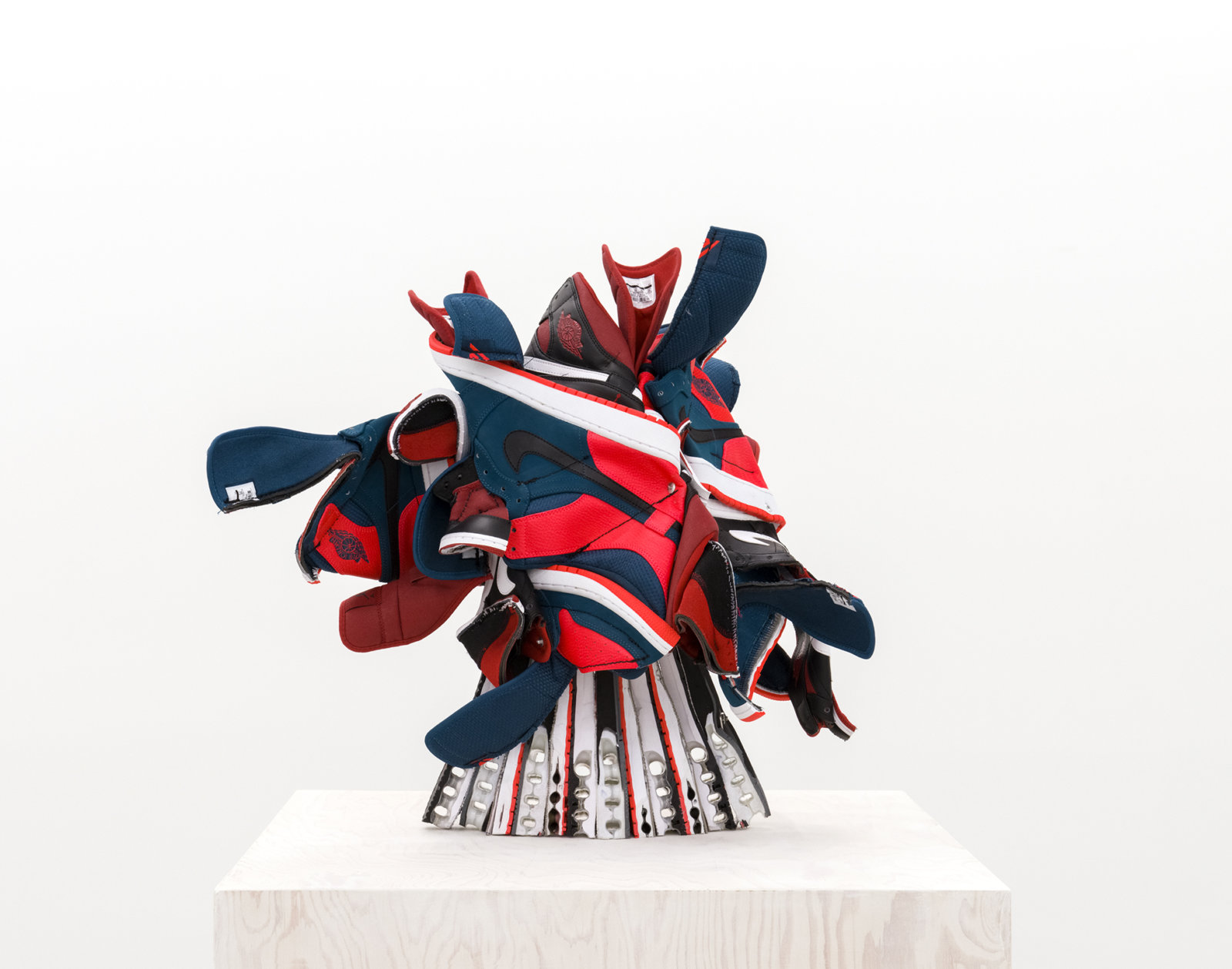 Brian Jungen, Broken Arrangement (detail), 2015–2016, nike air jordans, painted fir plywood, stainless steel, 75 x 20 x 20 in. (191 x 50 x 50 cm)