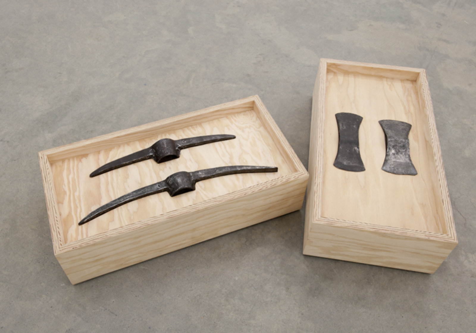 Brian Jungen, Bushido, 2012, fir plywood, axe heads, tree, book, 16 x 31 x 16 in. (41 x 79 x 41 cm)