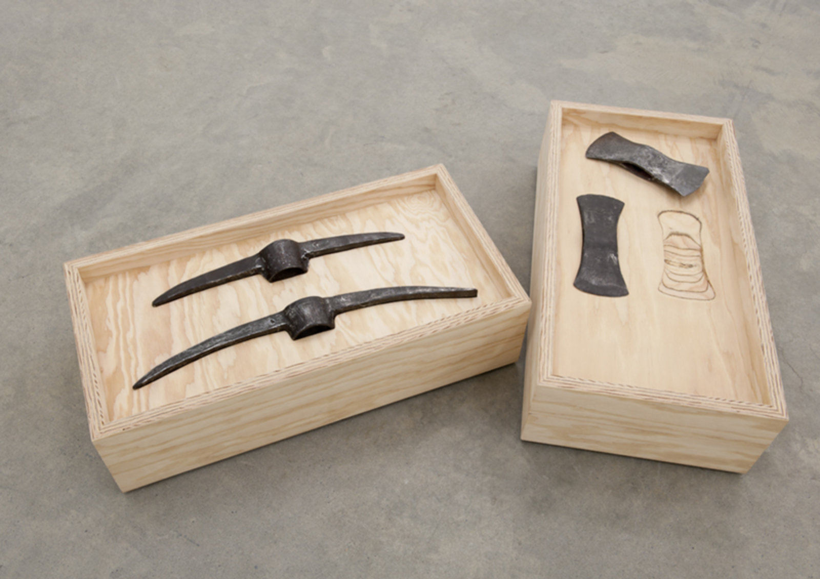 Brian Jungen, Bushido, 2012, fir plywood, axe heads, tree, book, 16 x 31 x 16 in. (41 x 79 x 41 cm)