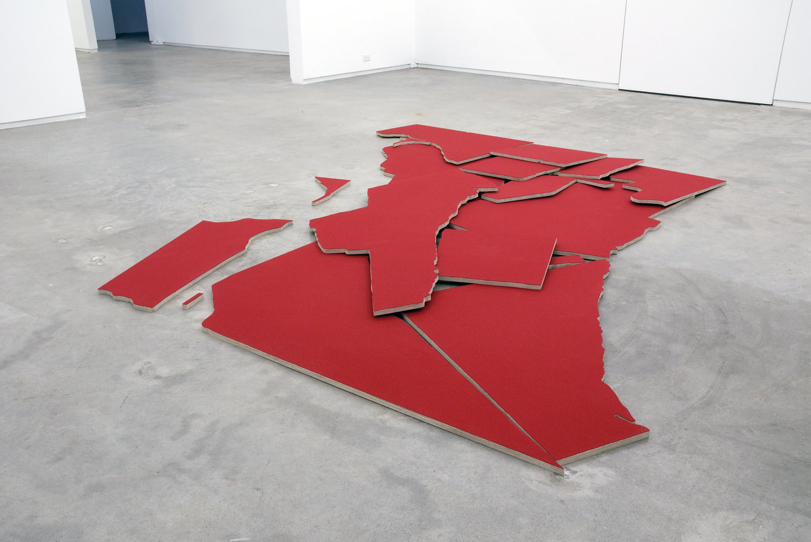 Brian Jungen, Greater Vancouver, 2007, 18 baltic plywood cutouts, wool fabric, 126 x 132 x 3 in. (320 x 335 x 8 cm)