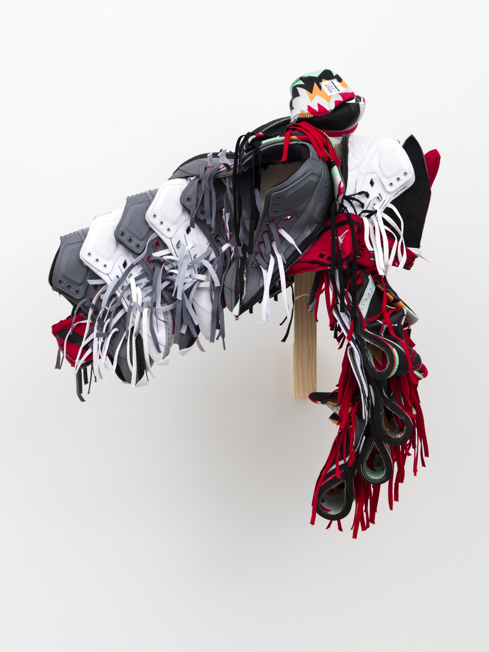 Brian Jungen, Horse Mask (Finn), 2016, nike air jordans, 34 x 27 x 20 in. (86 x 69 x 51 cm). Courtesy Casey Kaplan, New York