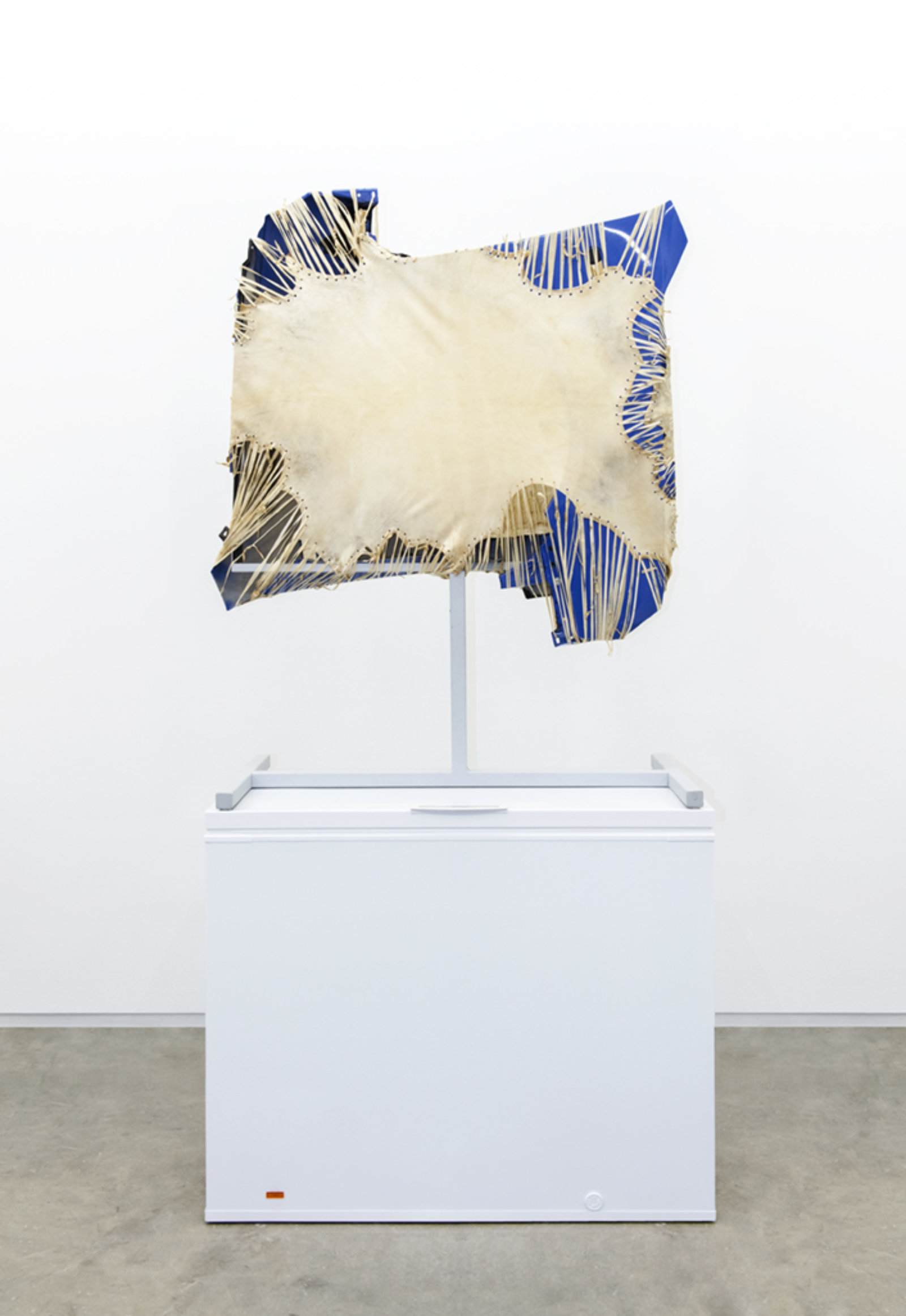 Brian Jungen, Mother Tongue, 2013, steel, deer hide, vw fenders, freezer, 100 x 51 x 28 in. (256 x 130 x 71 cm)