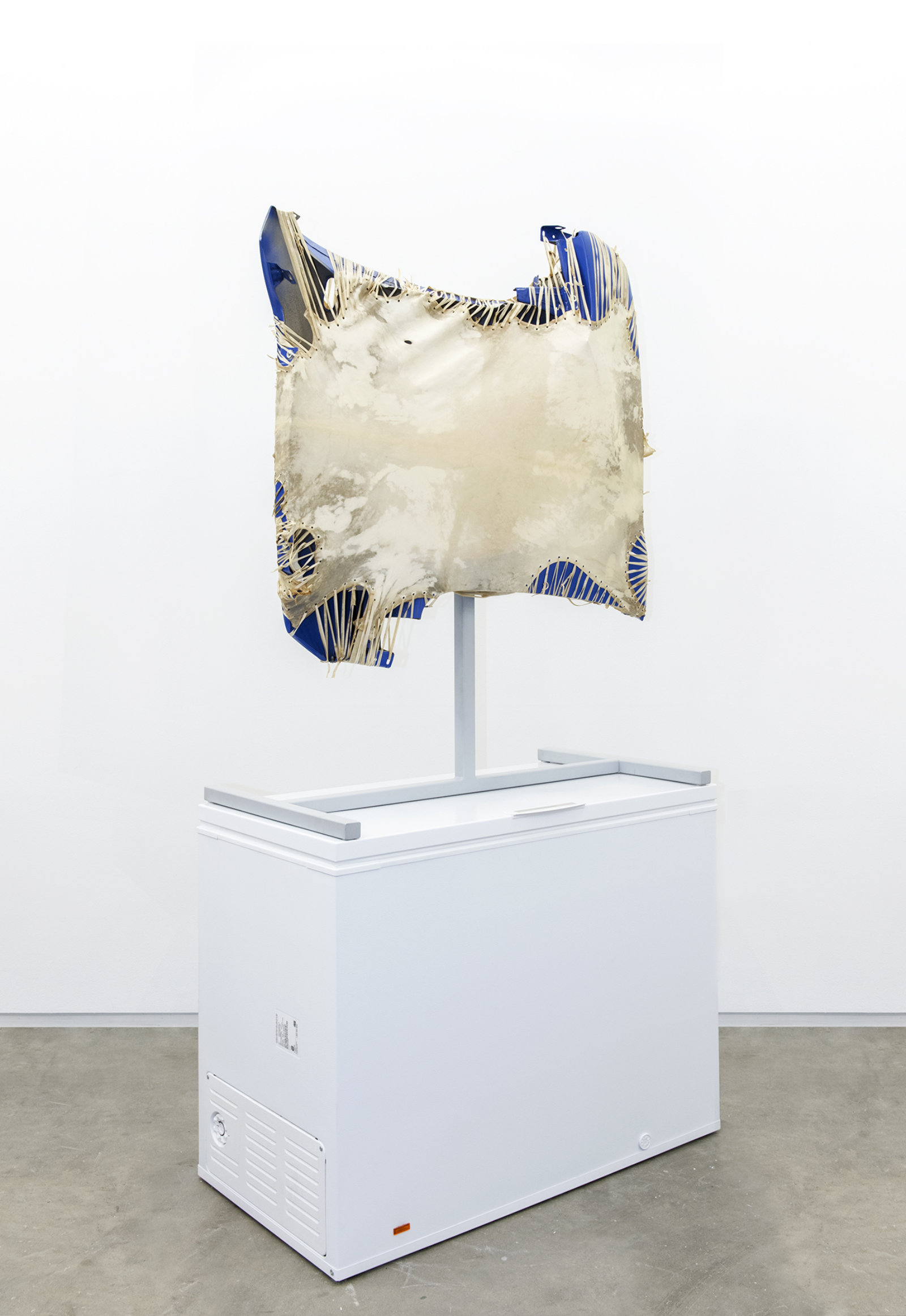Brian Jungen, Mother Tongue, 2013, steel, deer hide, vw fenders, freezer, 100 x 51 x 28 in. (256 x 130 x 71 cm)